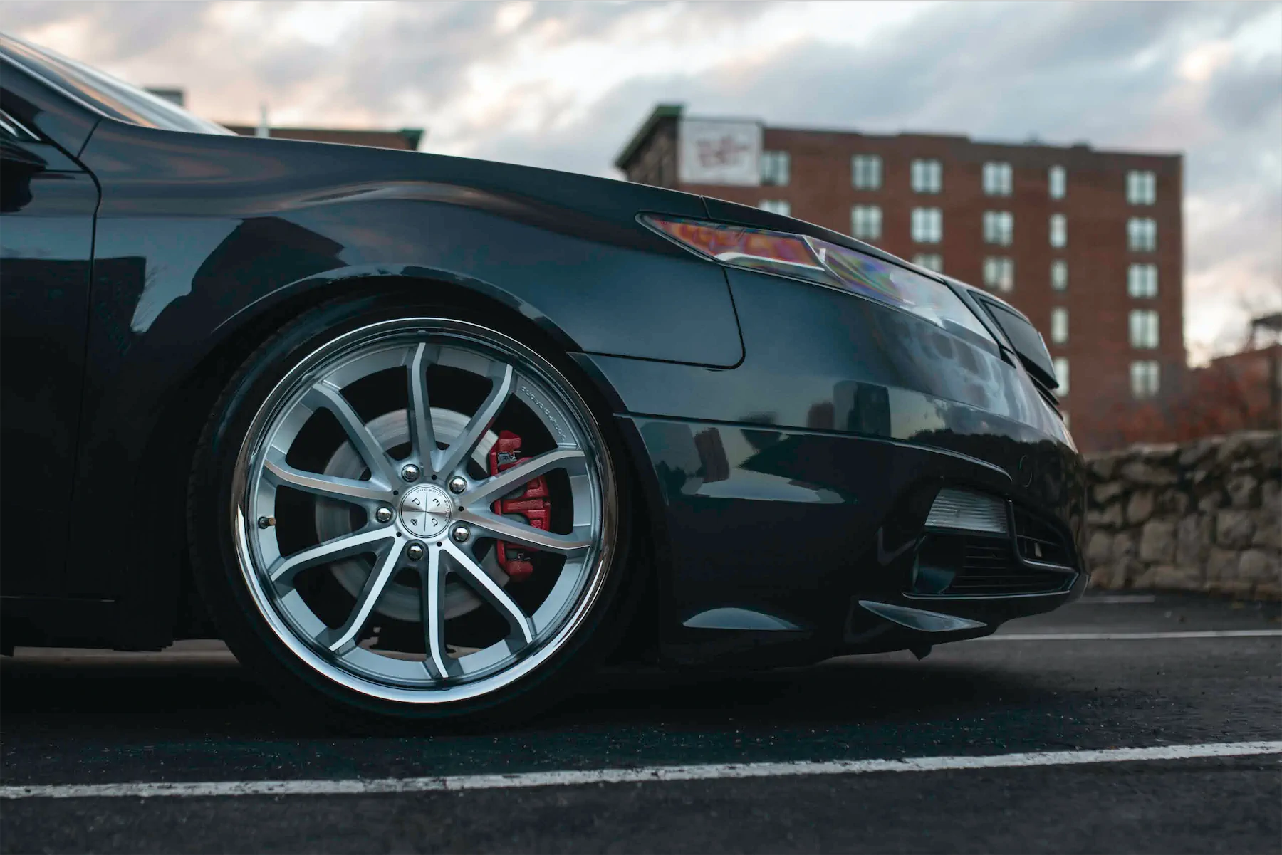 A 2012 Acura TL on Blaque Diamond BD-23 Silver Machined with Chrome Lip Wheels