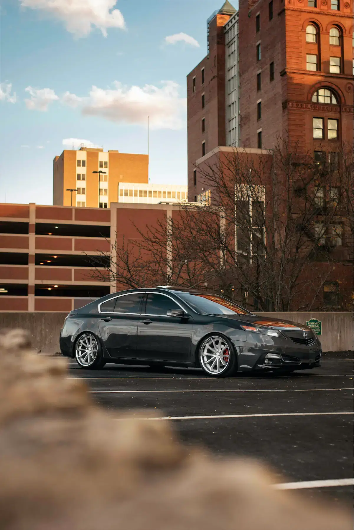 A 2012 Acura TL on Blaque Diamond BD-23 Silver Machined with Chrome Lip Wheels