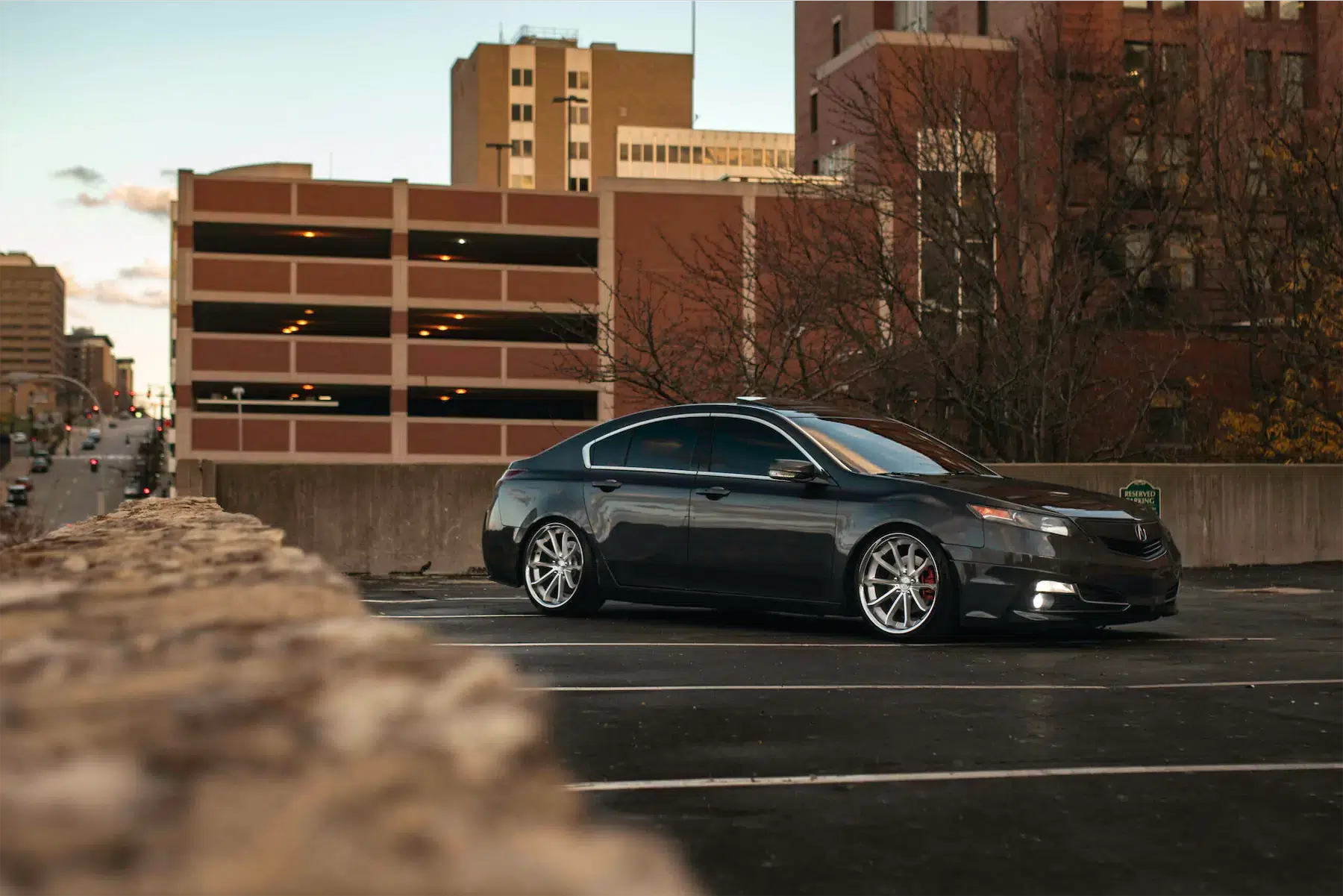 A 2012 Acura TL on Blaque Diamond BD-23 Silver Machined with Chrome Lip Wheels