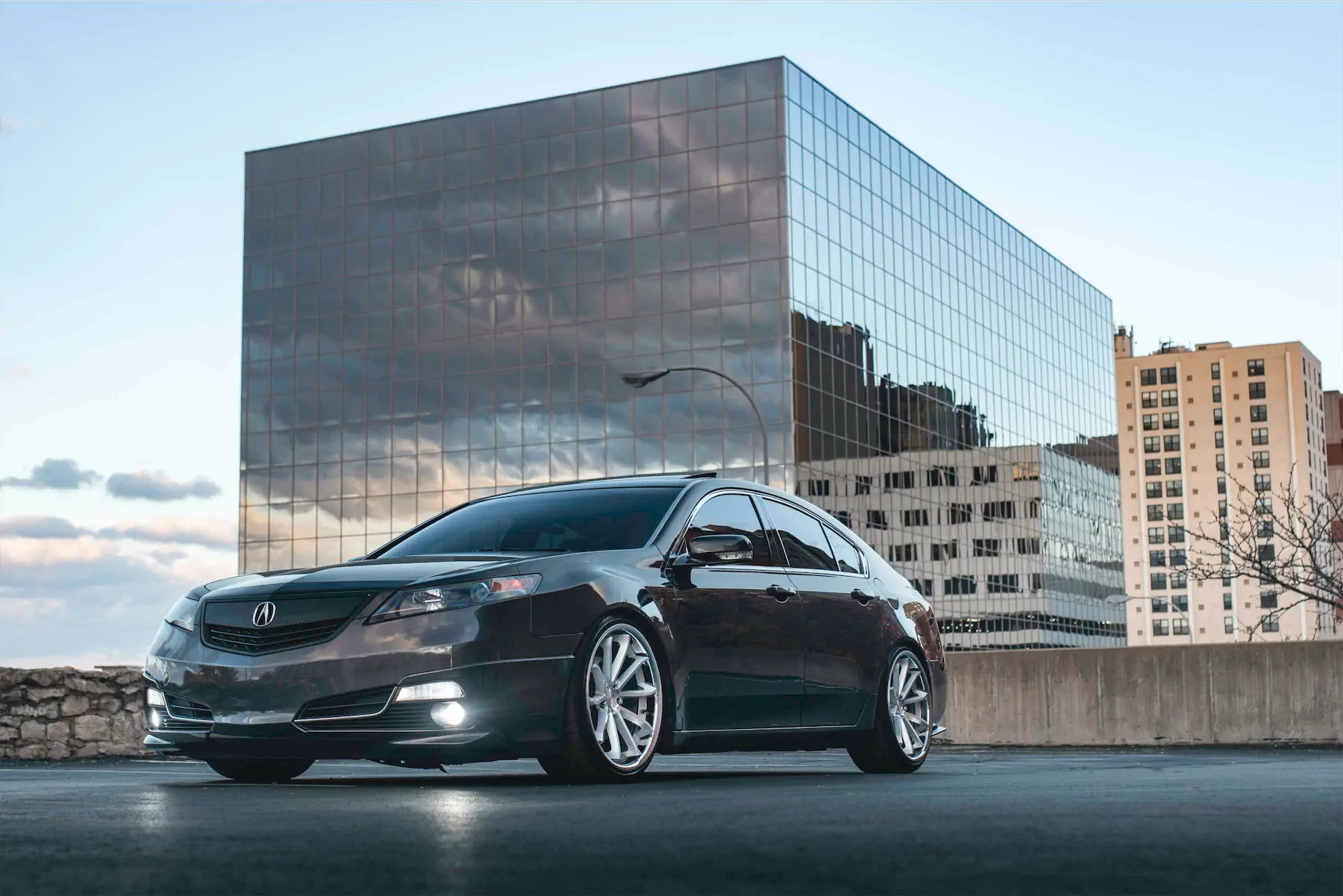 A 2012 Acura TL on Blaque Diamond BD-23 Silver Machined with Chrome Lip Wheels