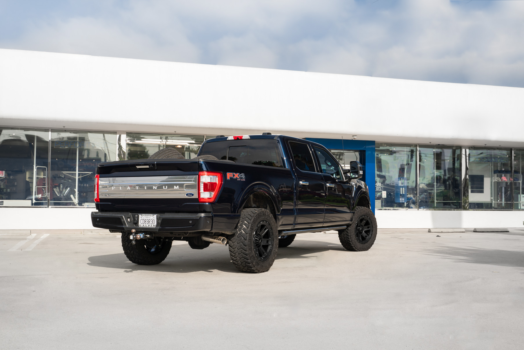 A 2022 Ford F150 Platinum on Blaque Diamond BD-O801 Textured Black Wheels
