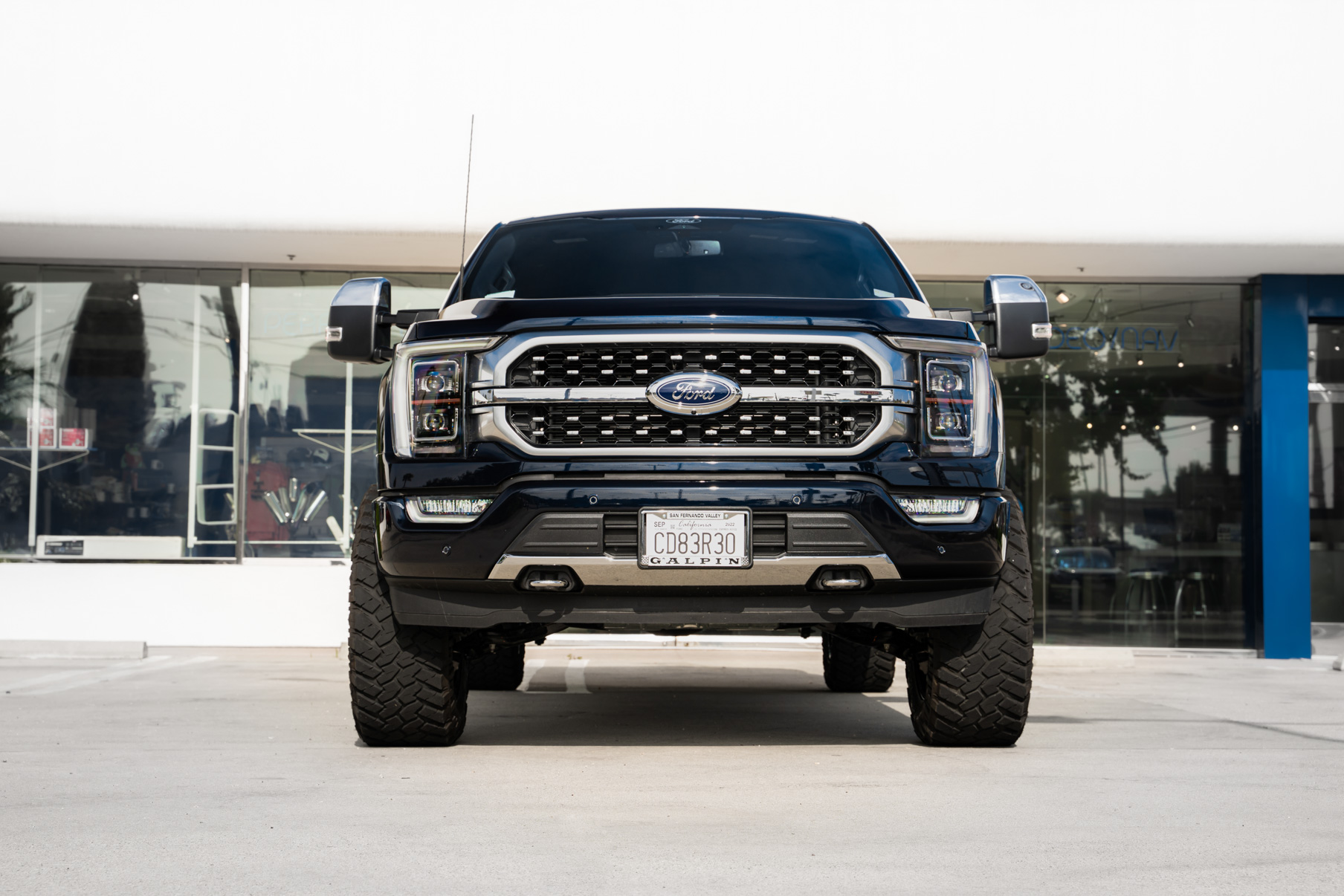 A 2022 Ford F150 Platinum on Blaque Diamond BD-O801 Textured Black Wheels