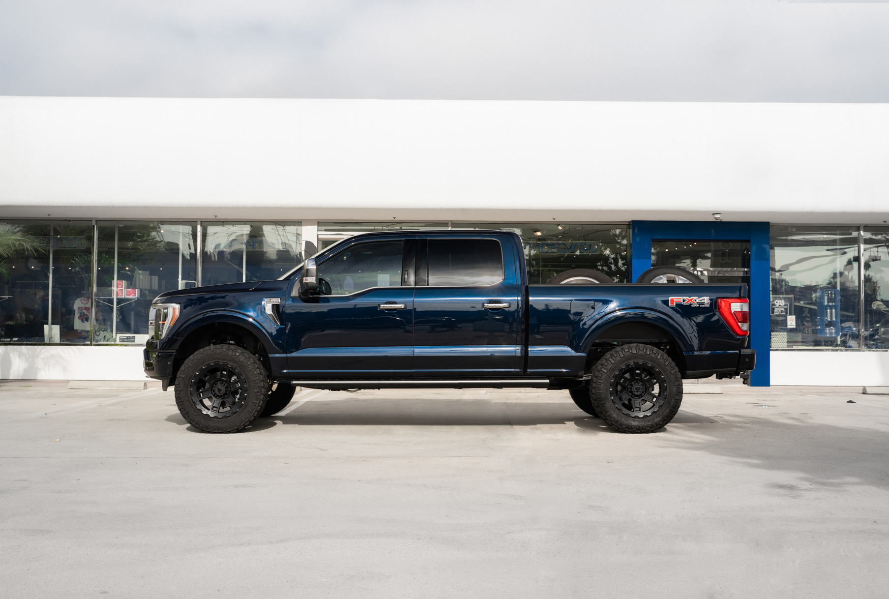 A 2022 Ford F150 Platinum on Blaque Diamond BD-O801 Textured Black Wheels
