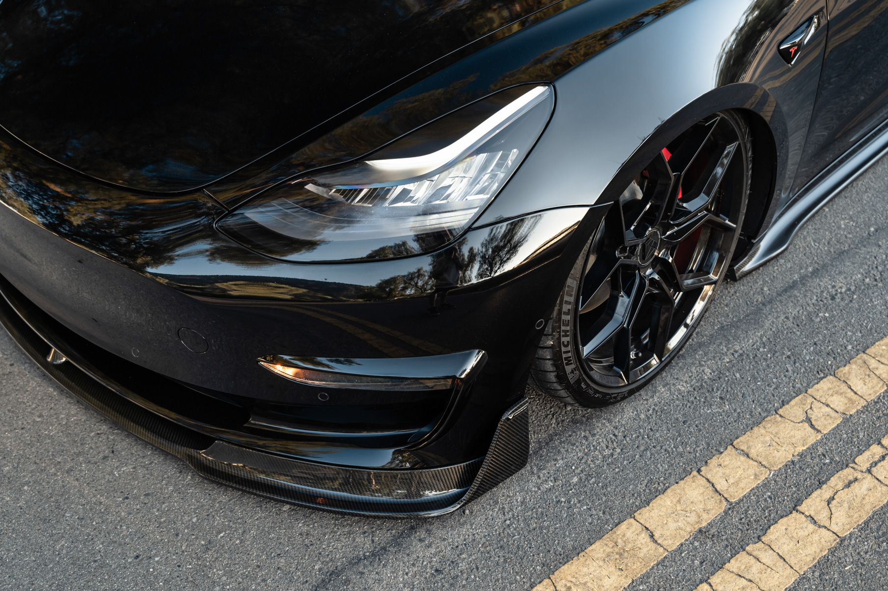 A 2019 Tesla Model 3 Performance on Blaque Diamond BD-F25 Gloss Black Wheels