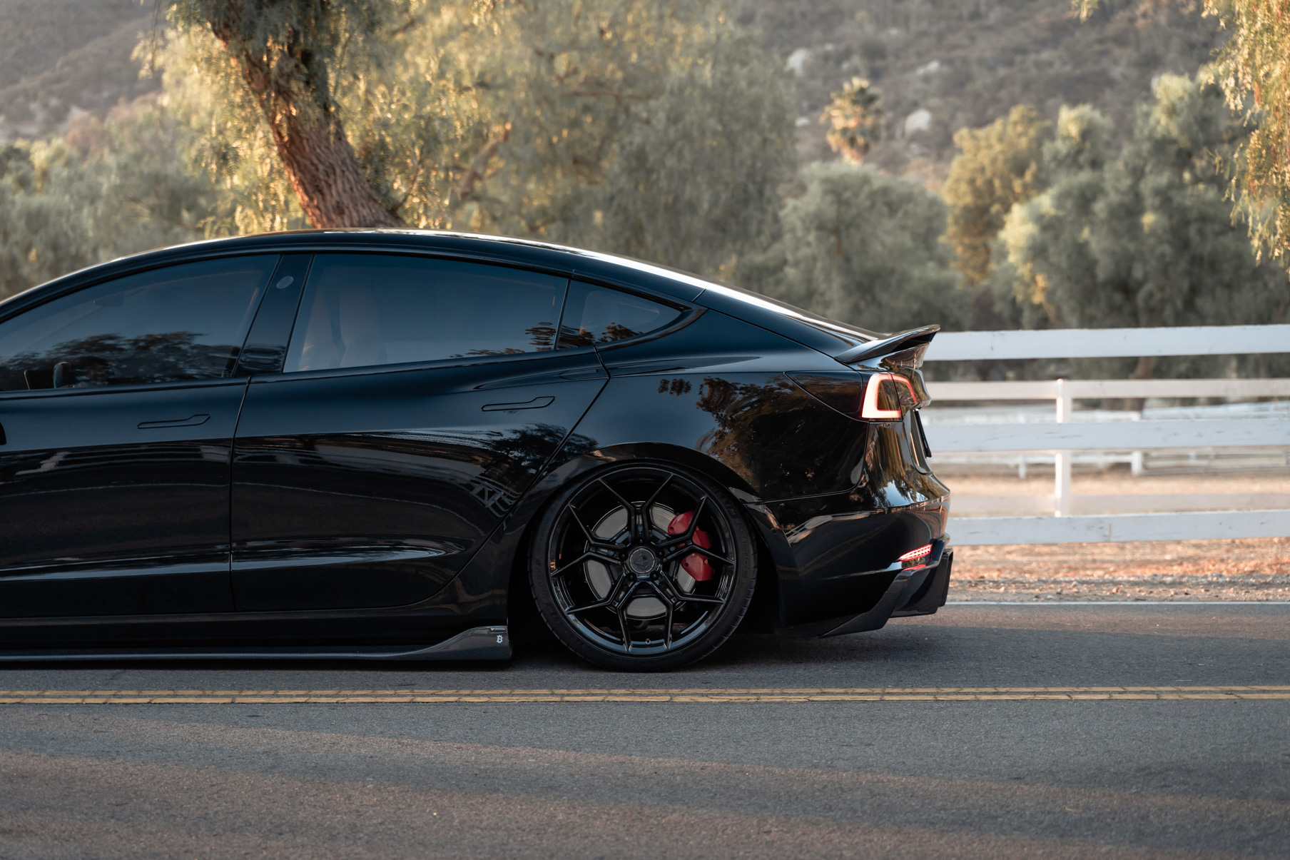 A 2019 Tesla Model 3 Performance on Blaque Diamond BD-F25 Gloss Black Wheels