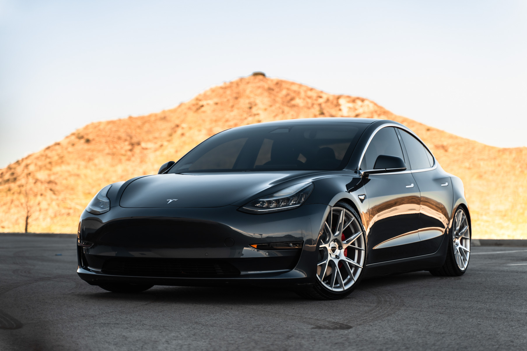 A 2019 Tesla Model 3 on Blaque Diamond BD-F18 Brushed Silver Wheels