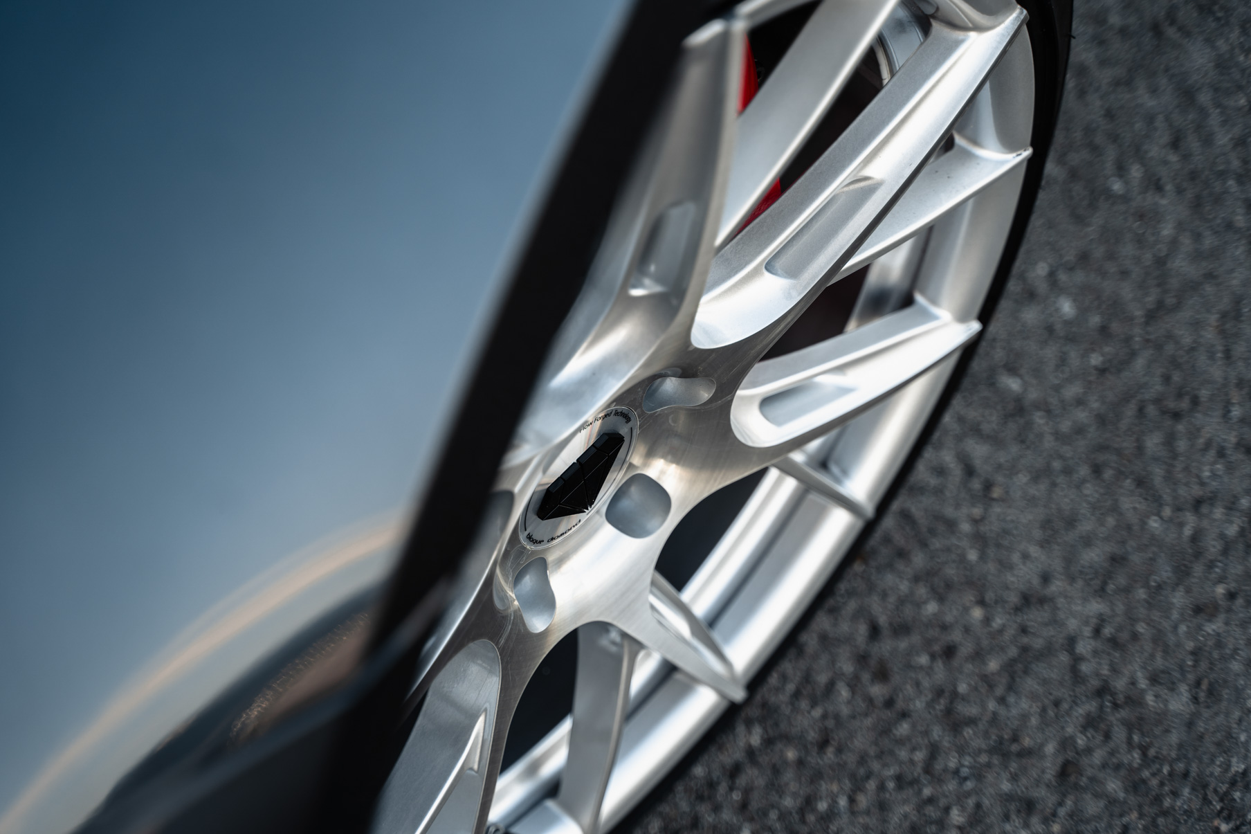 A 2019 Tesla Model 3 on Blaque Diamond BD-F18 Brushed Silver Wheels