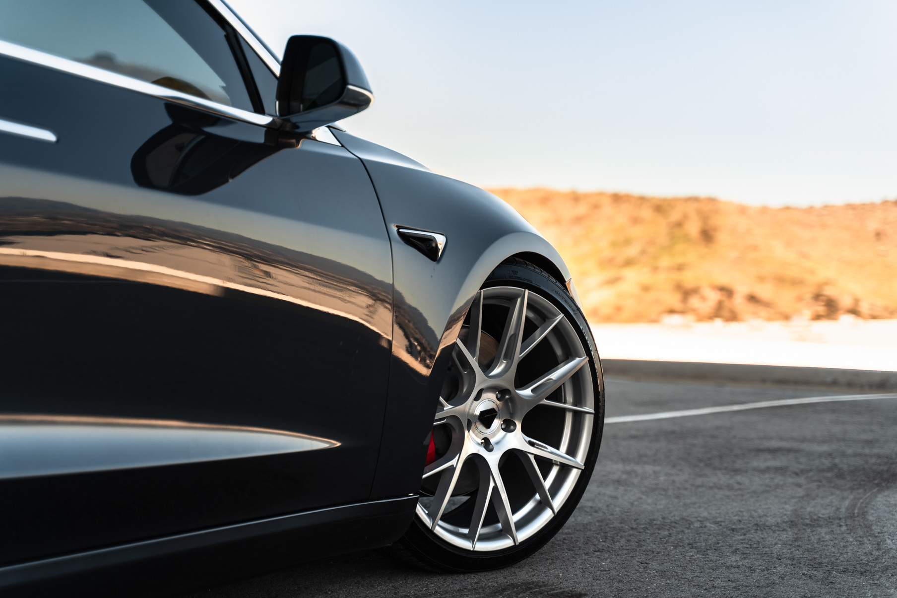 A 2019 Tesla Model 3 on Blaque Diamond BD-F18 Brushed Silver Wheels