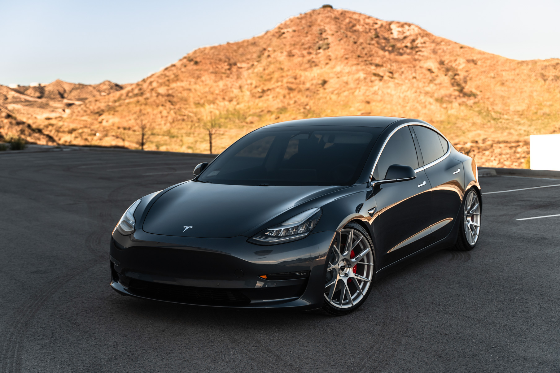 A 2019 Tesla Model 3 on Blaque Diamond BD-F18 Brushed Silver Wheels