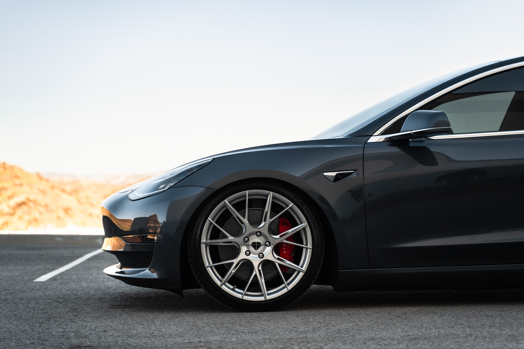 A 2019 Tesla Model 3 on Blaque Diamond BD-F18 Brushed Silver Wheels