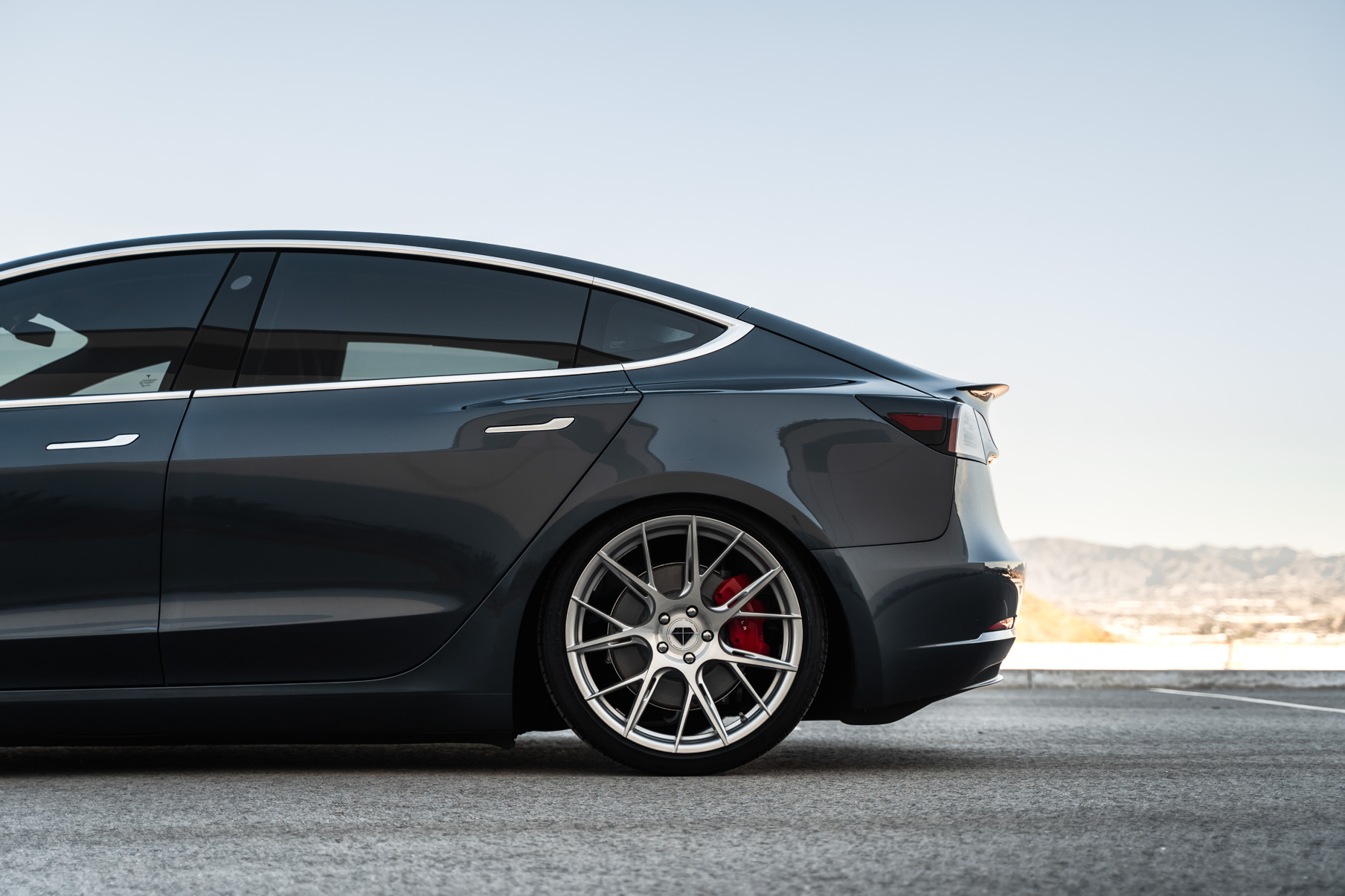 A 2019 Tesla Model 3 on Blaque Diamond BD-F18 Brushed Silver Wheels