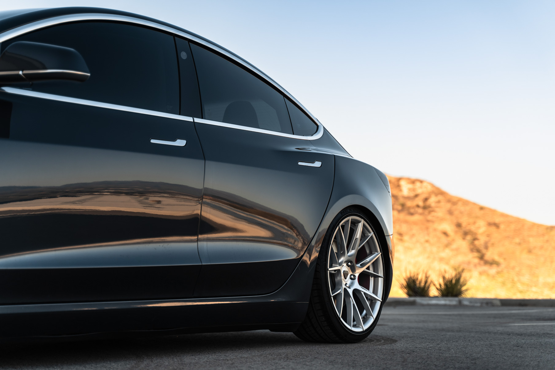 A 2019 Tesla Model 3 on Blaque Diamond BD-F18 Brushed Silver Wheels