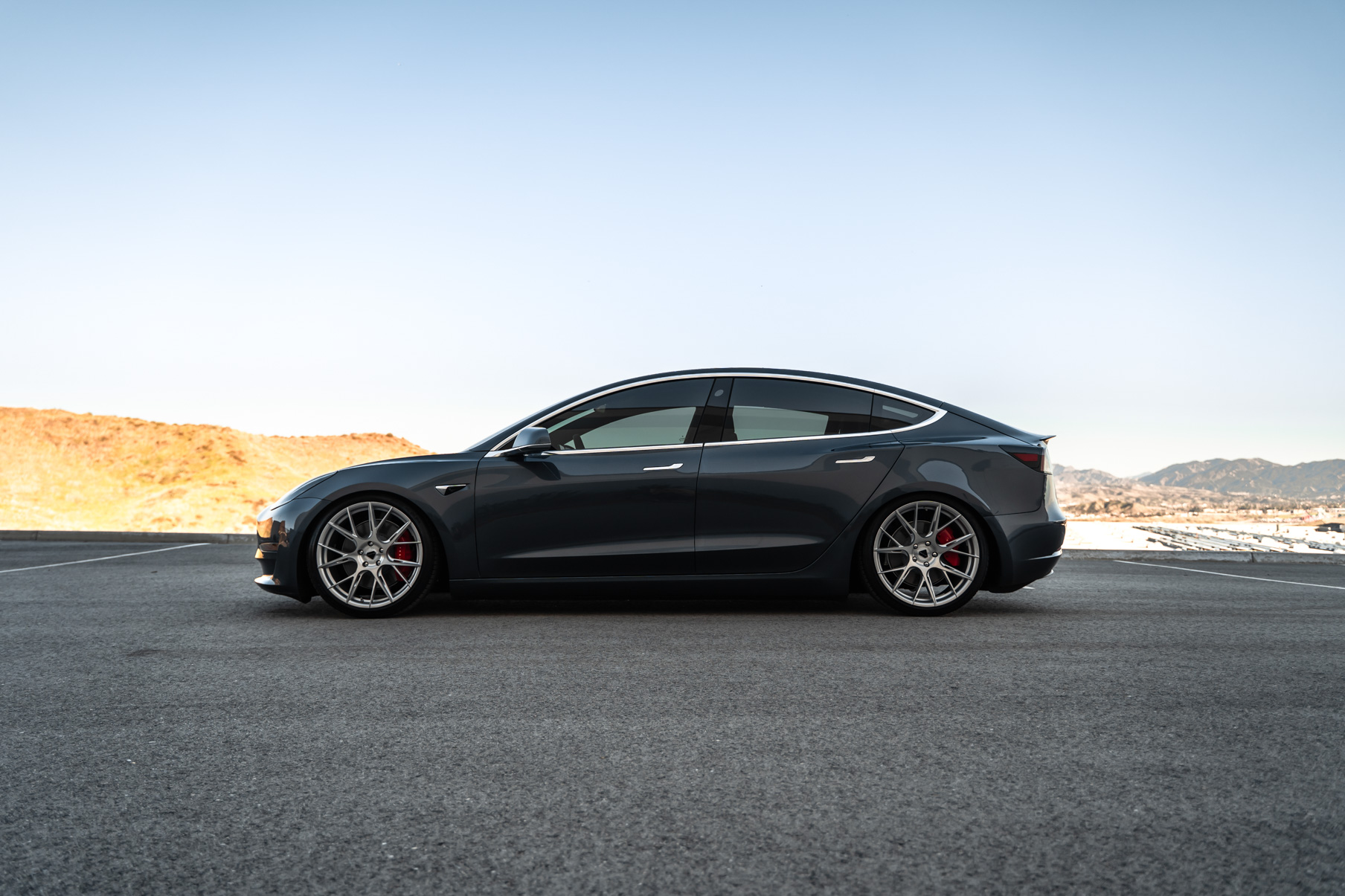 A 2019 Tesla Model 3 on Blaque Diamond BD-F18 Brushed Silver Wheels