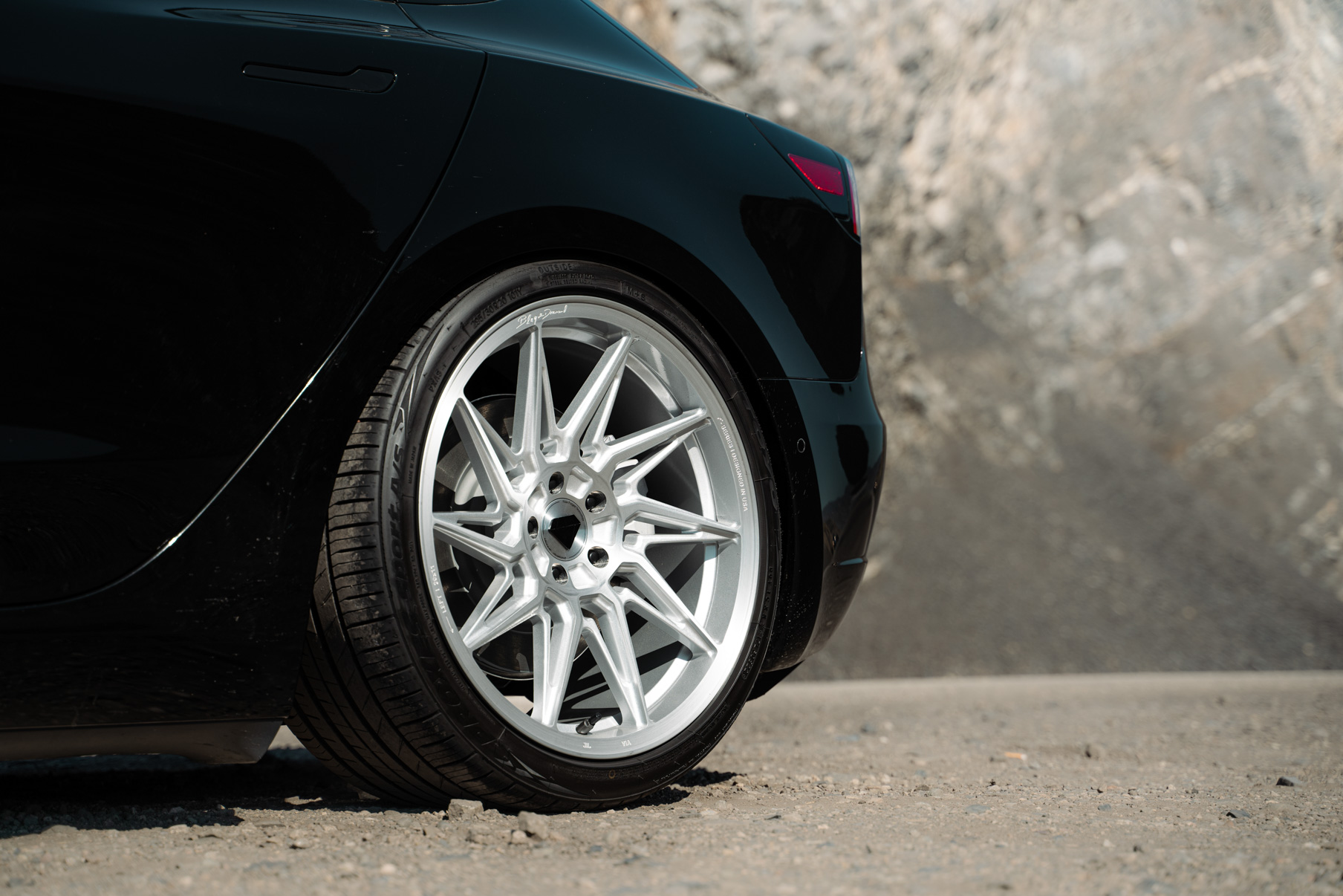 A 2022 Tesla Model 3 Blaque Diamond BD-F20 20 Inch Brushed Silver Wheels