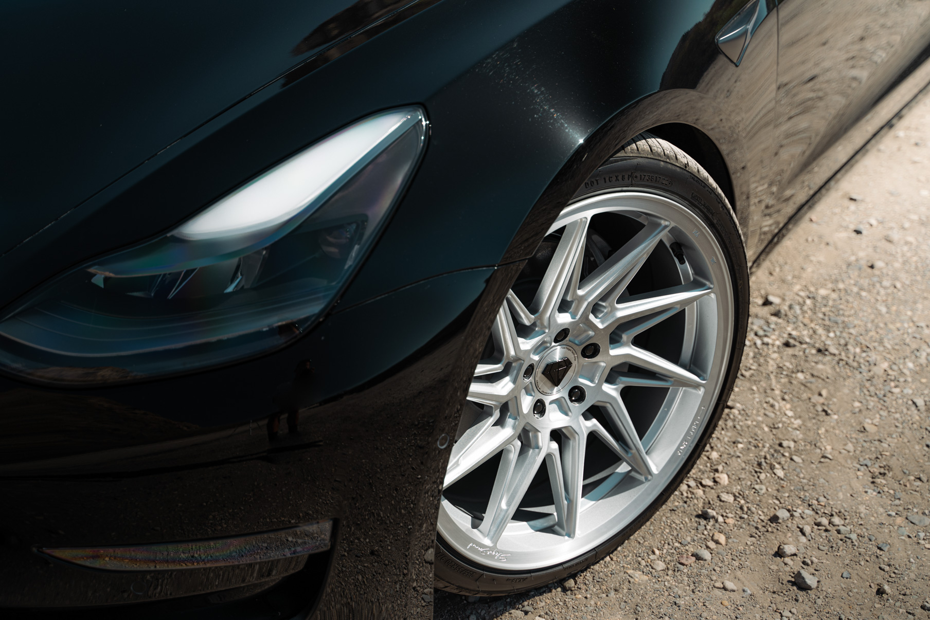 A 2022 Tesla Model 3 Blaque Diamond BD-F20 20 Inch Brushed Silver Wheels