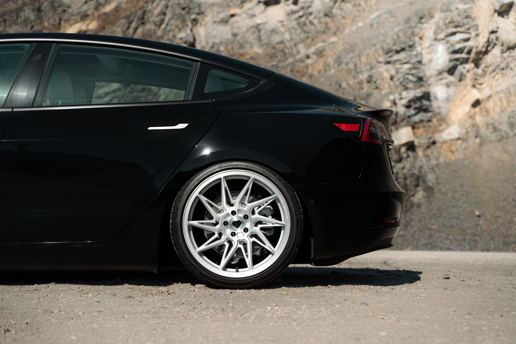 A 2022 Tesla Model 3 Blaque Diamond BD-F20 20 Inch Brushed Silver Wheels