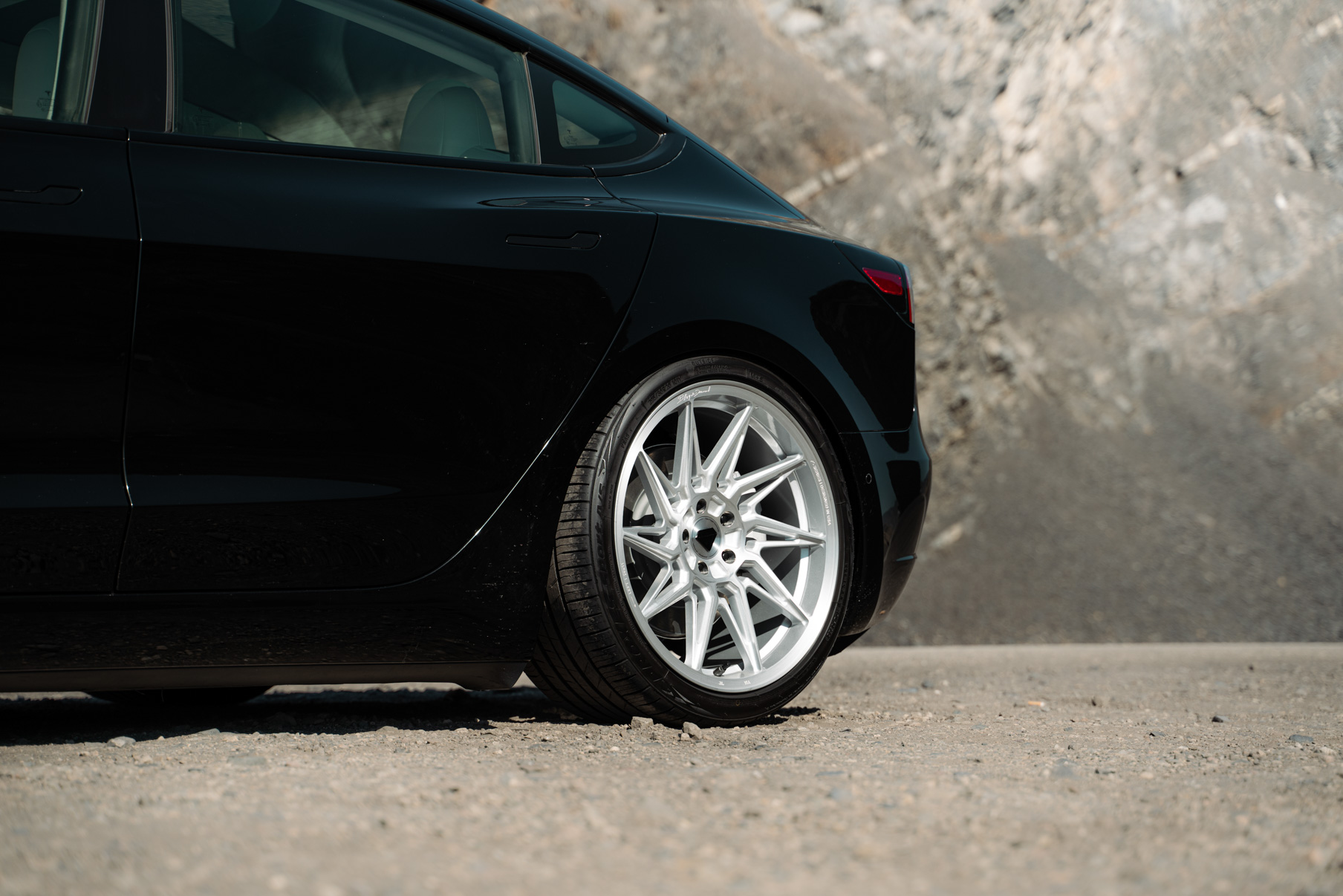 A 2022 Tesla Model 3 Blaque Diamond BD-F20 20 Inch Brushed Silver Wheels