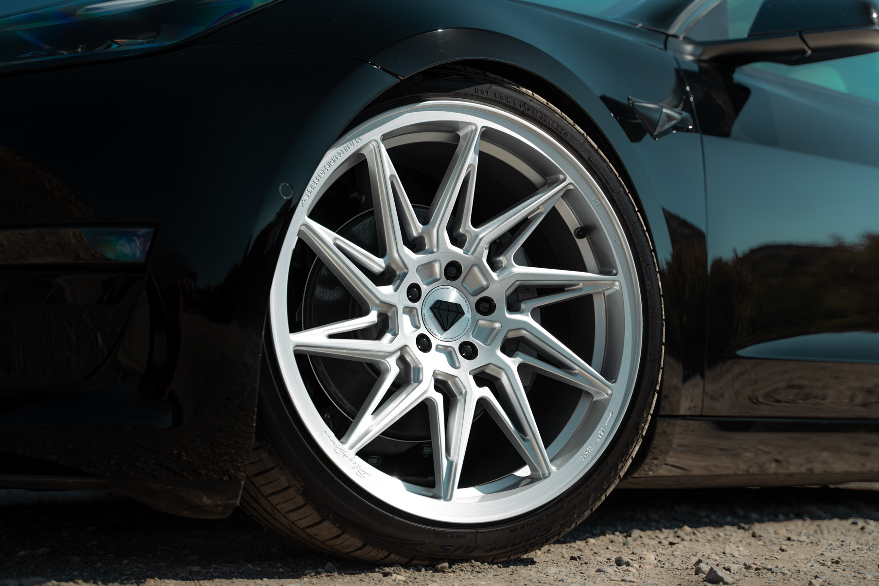 A 2022 Tesla Model 3 Blaque Diamond BD-F20 20 Inch Brushed Silver Wheels