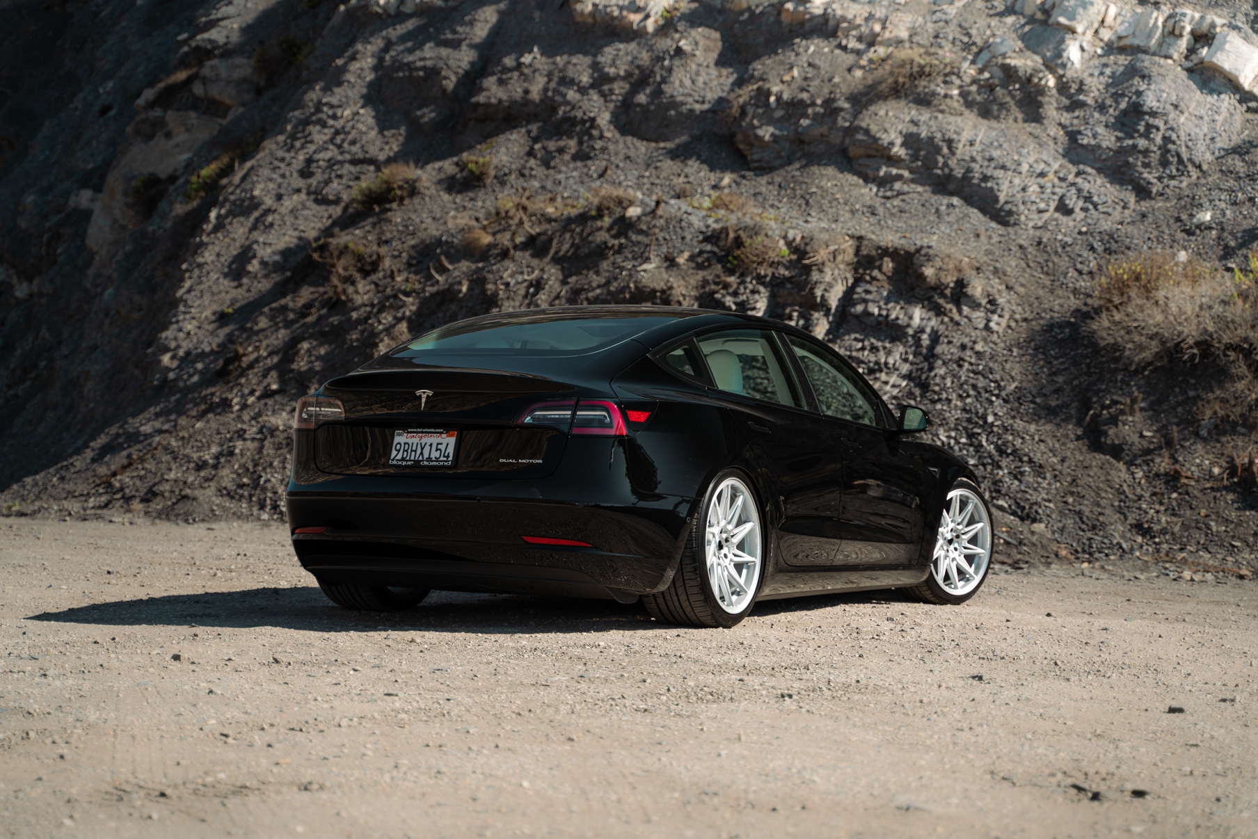 A 2022 Tesla Model 3 Blaque Diamond BD-F20 20 Inch Brushed Silver Wheels