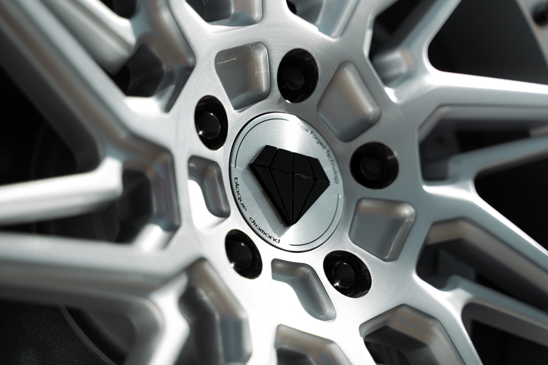 A 2022 Tesla Model 3 Blaque Diamond BD-F20 20 Inch Brushed Silver Wheels