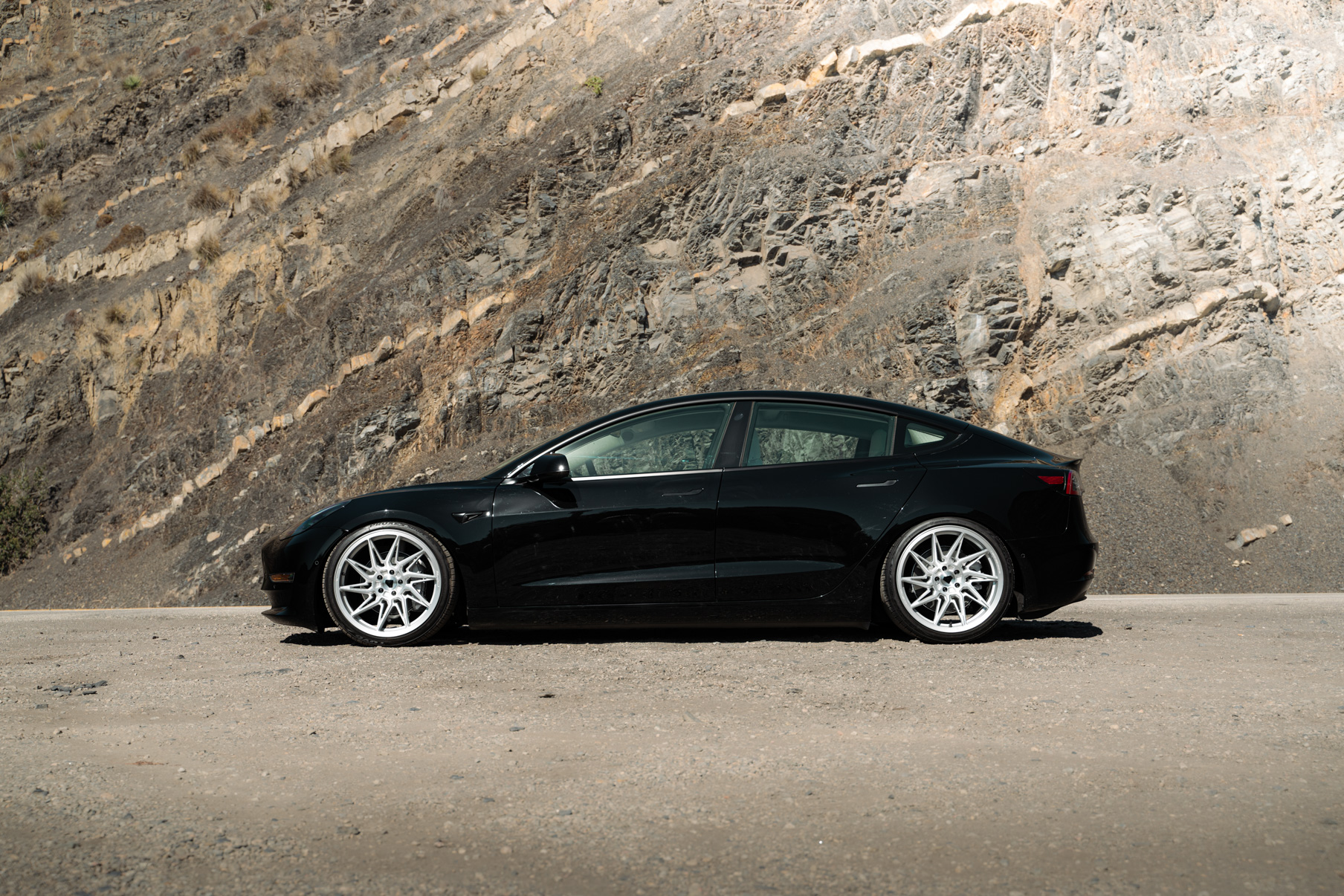 A 2022 Tesla Model 3 Blaque Diamond BD-F20 20 Inch Brushed Silver Wheels