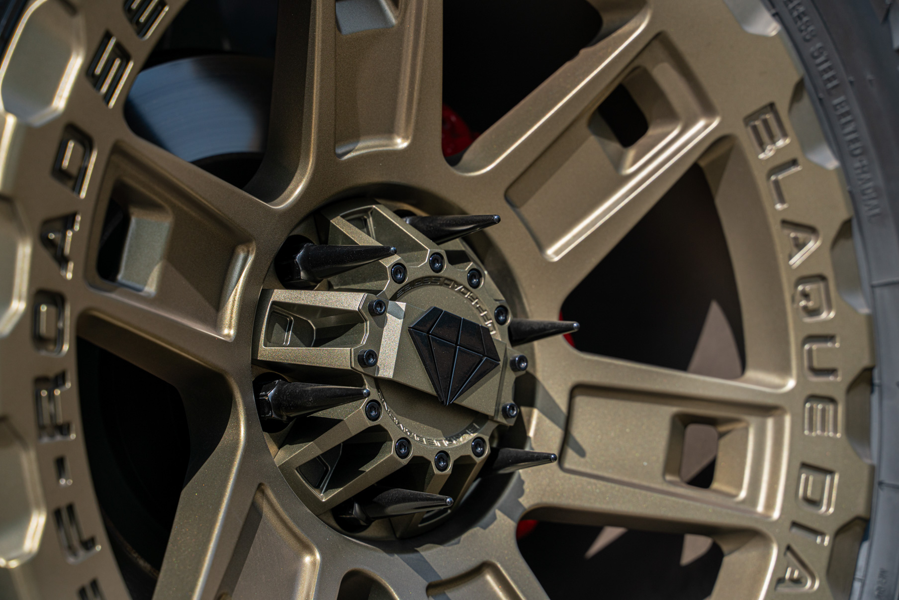 A 2022 Toyota Tundra TRD on Blaque Diamond BD-O801 20 Inch Matte Bronze Wheels