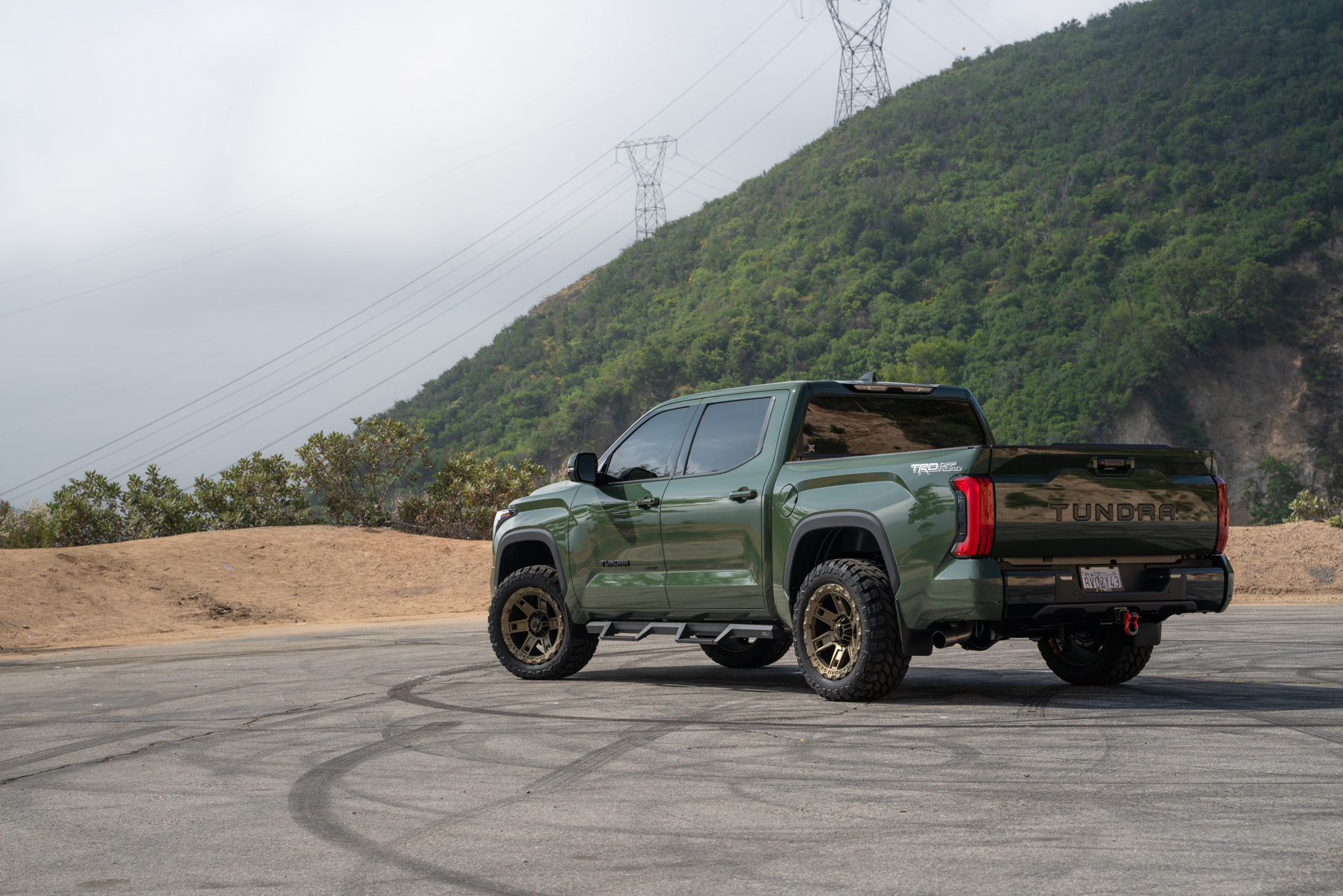 A 2022 Toyota Tundra TRD on Blaque Diamond BD-O801 20 Inch Matte Bronze Wheels