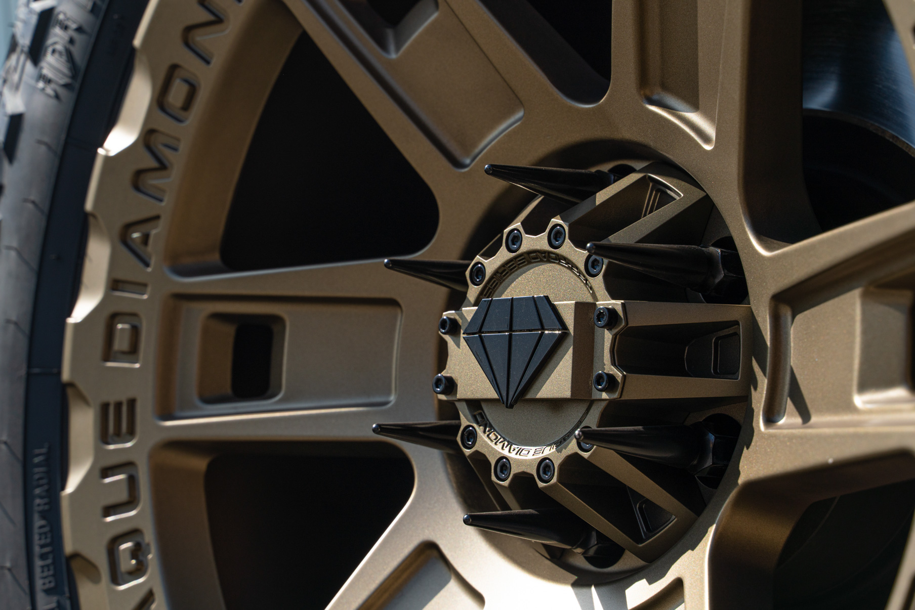 A 2022 Toyota Tundra TRD on Blaque Diamond BD-O801 20 Inch Matte Bronze Wheels