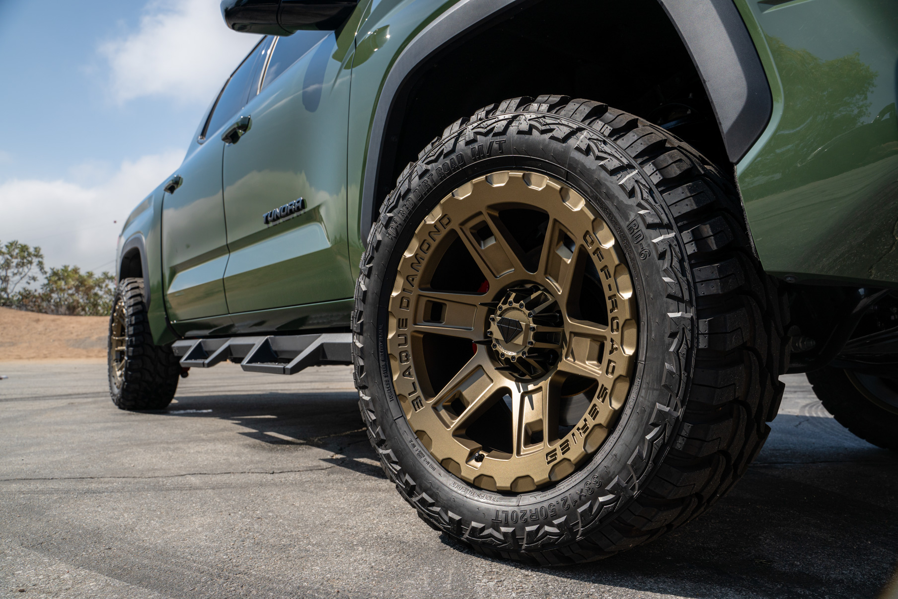 A 2022 Toyota Tundra TRD on Blaque Diamond BD-O801 20 Inch Matte Bronze Wheels
