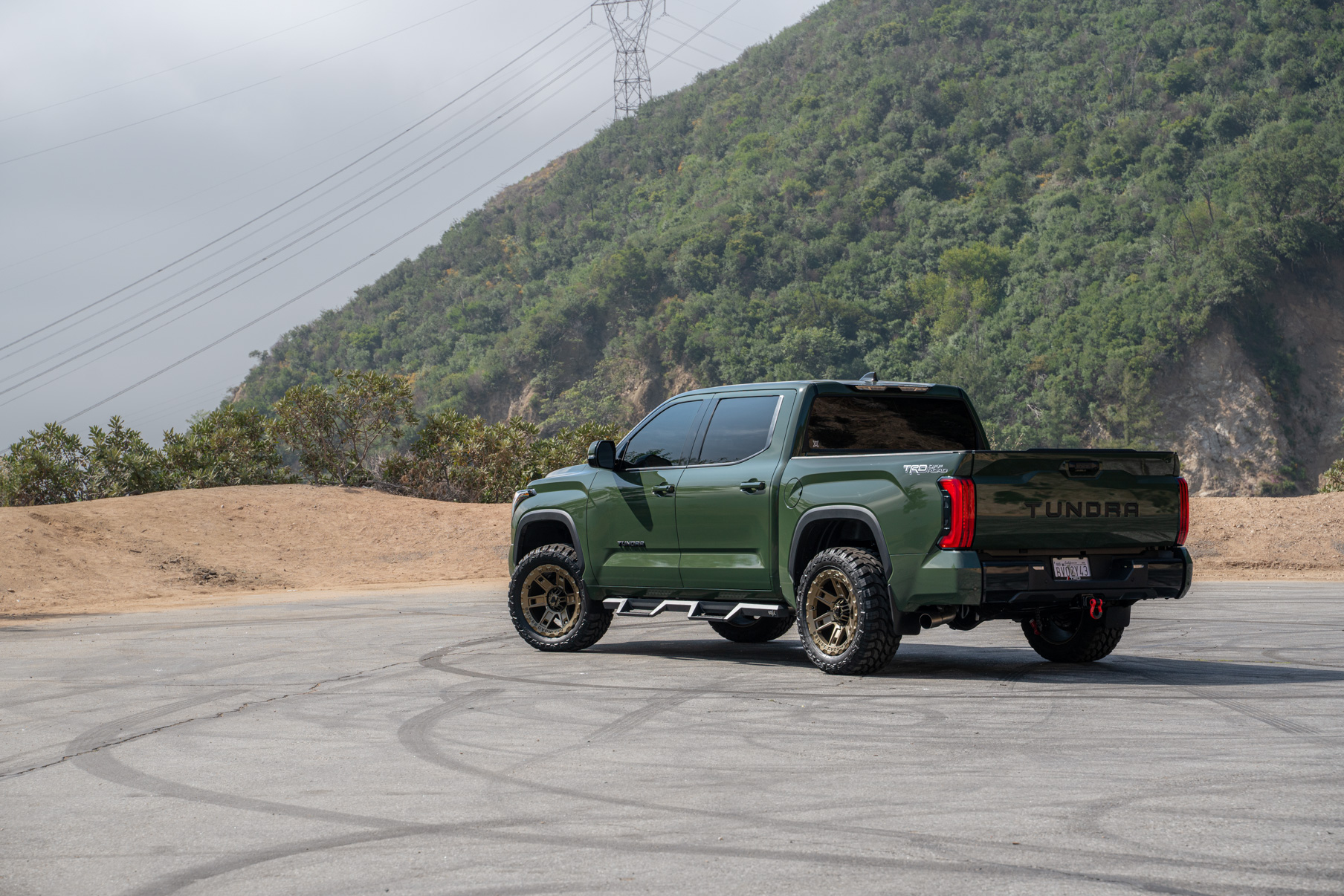 A 2022 Toyota Tundra TRD on Blaque Diamond BD-O801 20 Inch Matte Bronze Wheels