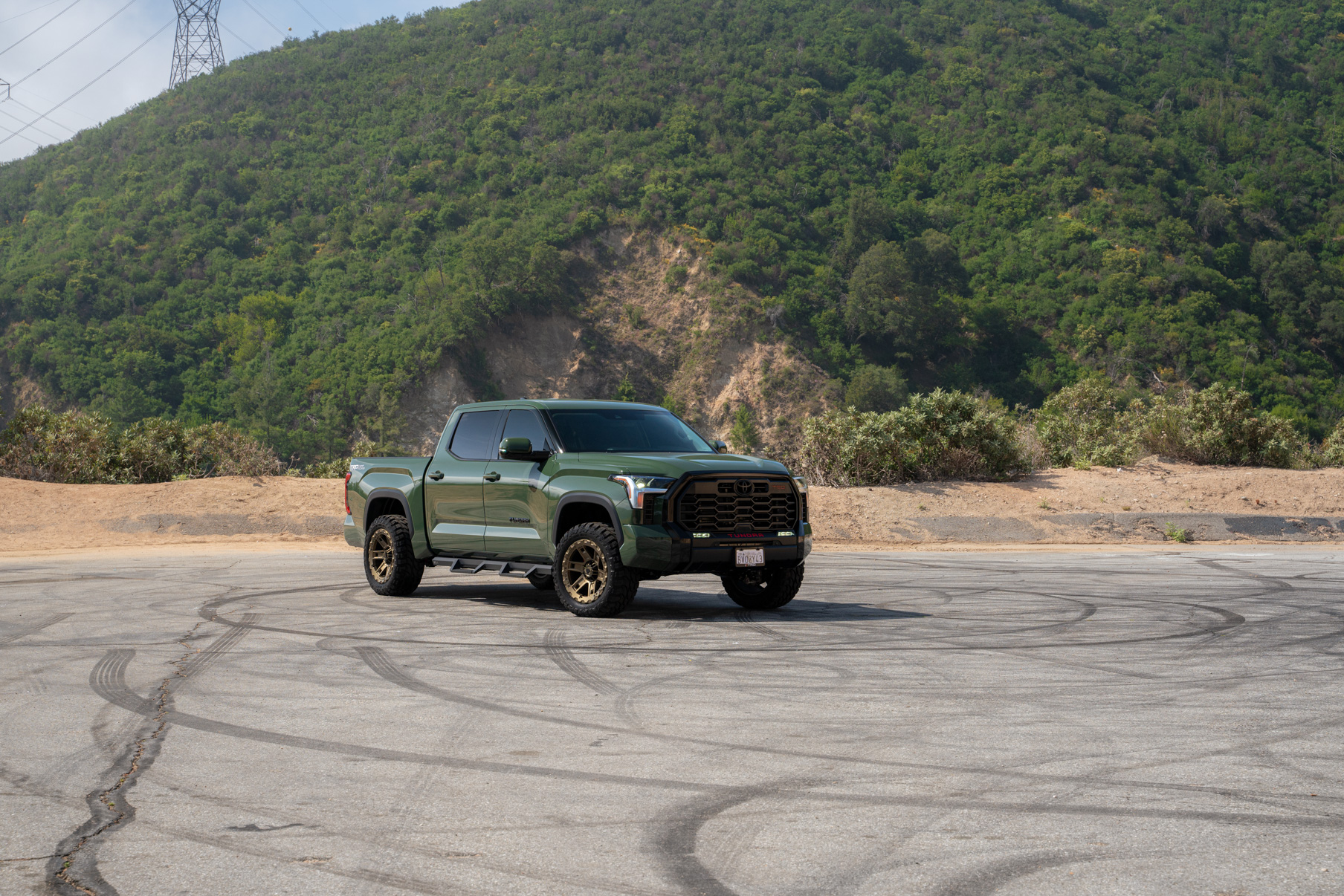 A 2022 Toyota Tundra TRD on Blaque Diamond BD-O801 20 Inch Matte Bronze Wheels