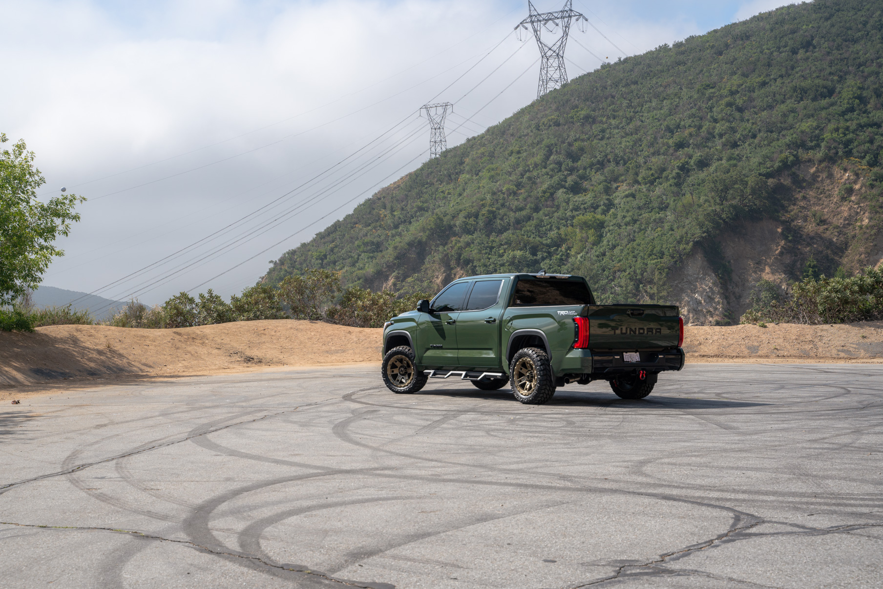 A 2022 Toyota Tundra TRD on Blaque Diamond BD-O801 20 Inch Matte Bronze Wheels