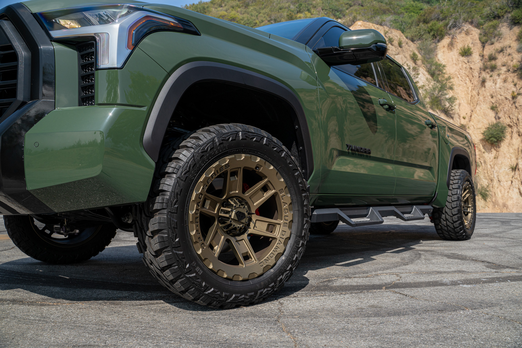 A 2022 Toyota Tundra TRD on Blaque Diamond BD-O801 20 Inch Matte Bronze Wheels