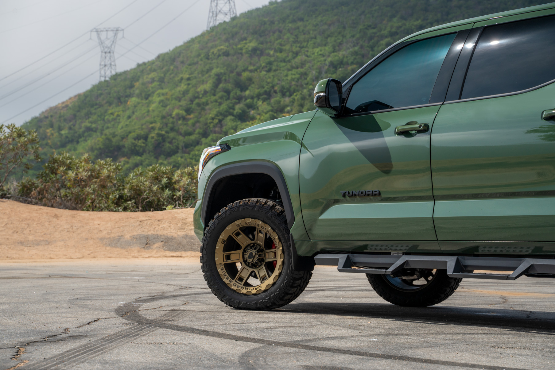 A 2022 Toyota Tundra TRD on Blaque Diamond BD-O801 20 Inch Matte Bronze Wheels