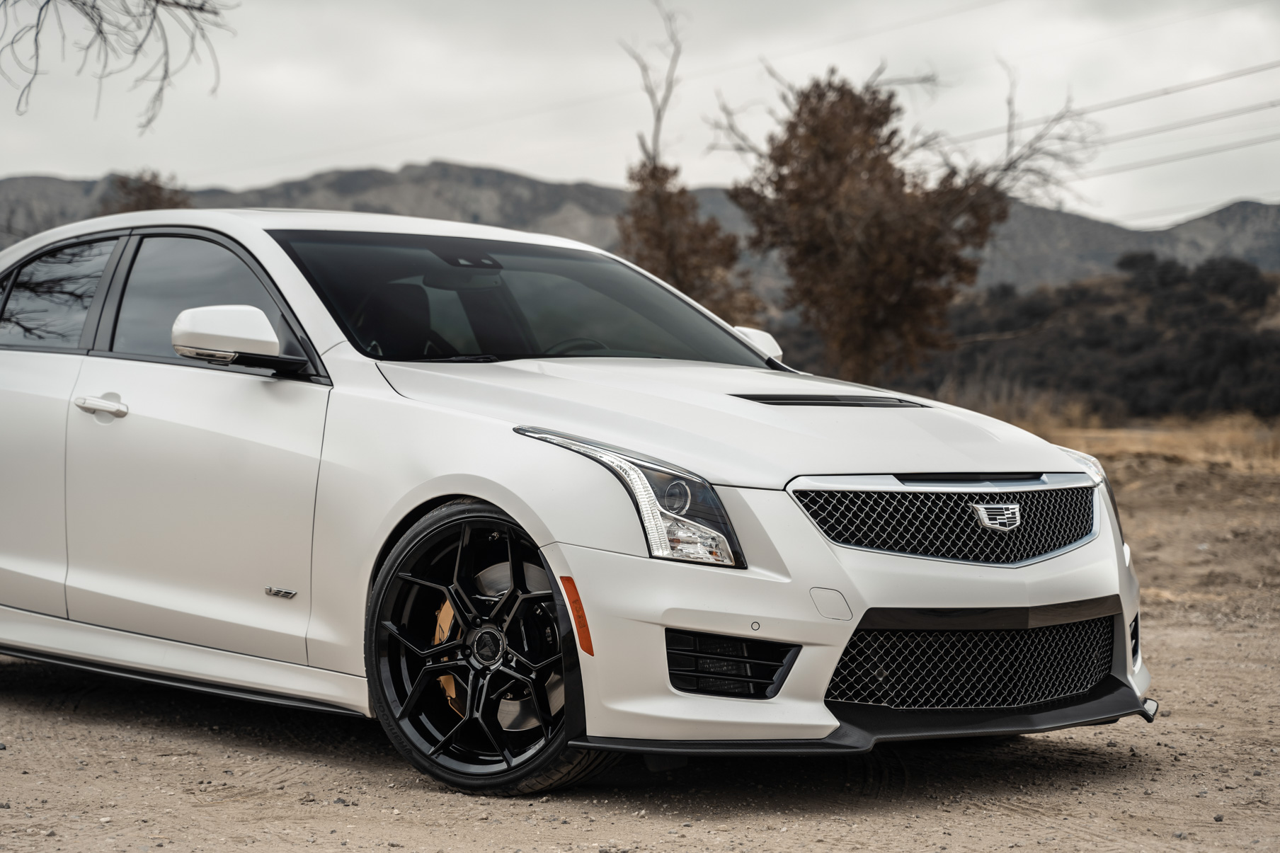 A 2018 Cadillac ATS V Coupe on Blaque Diamond BD-F25 Gloss Black Wheels