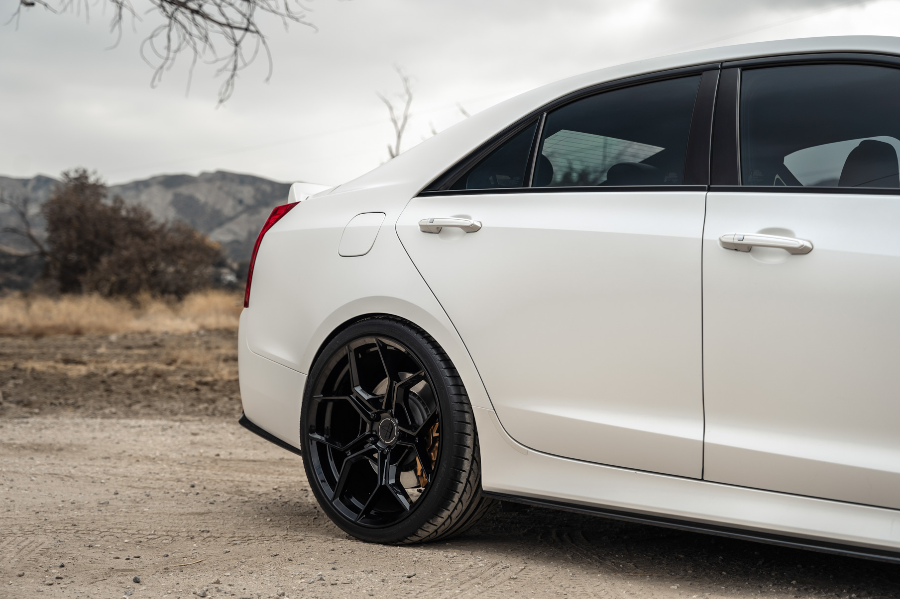 A 2018 Cadillac ATS V Coupe on Blaque Diamond BD-F25 Gloss Black Wheels