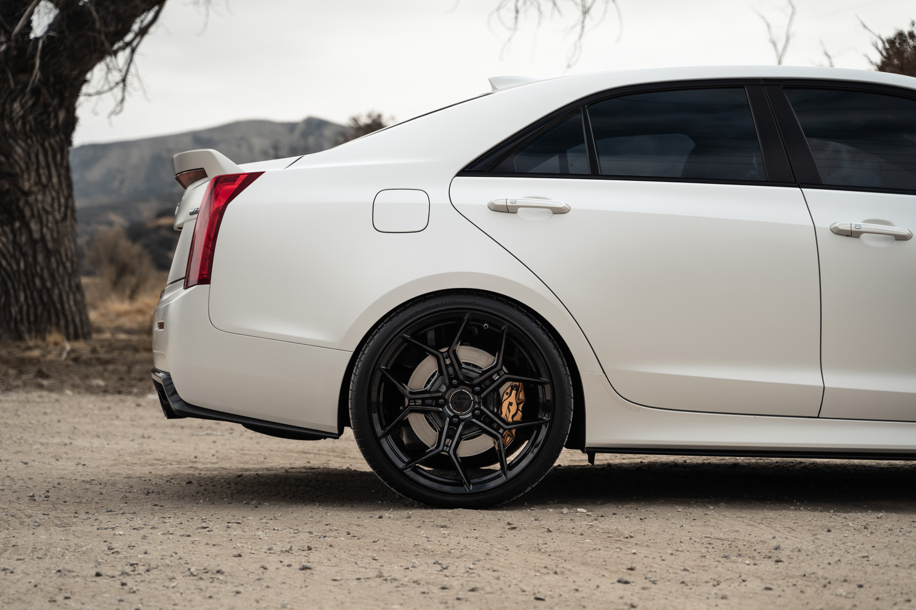 A 2018 Cadillac ATS V Coupe on Blaque Diamond BD-F25 Gloss Black Wheels