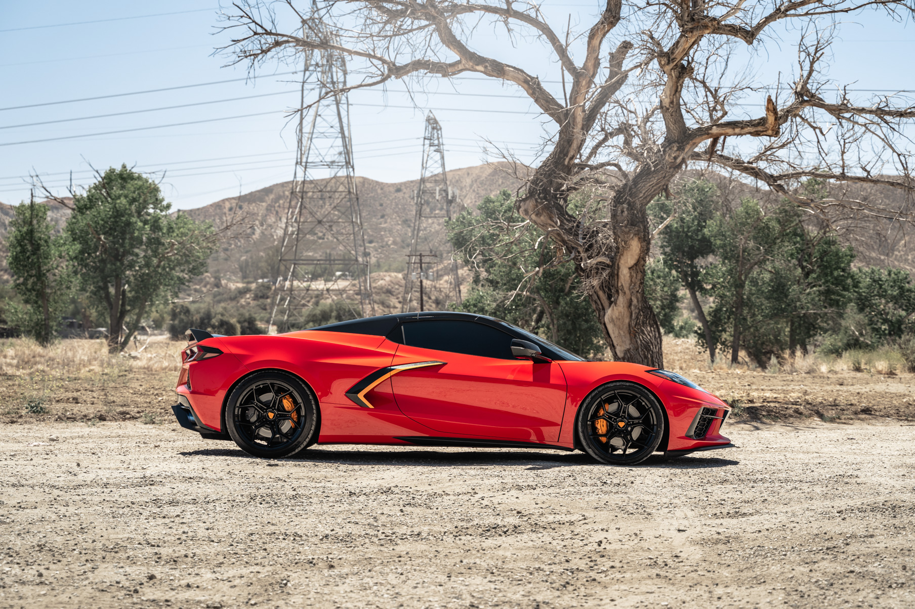 A Red 2021 Chevrolet Corvette C8 on Blaque Diamond BD-F25 Gloss Black Wheels