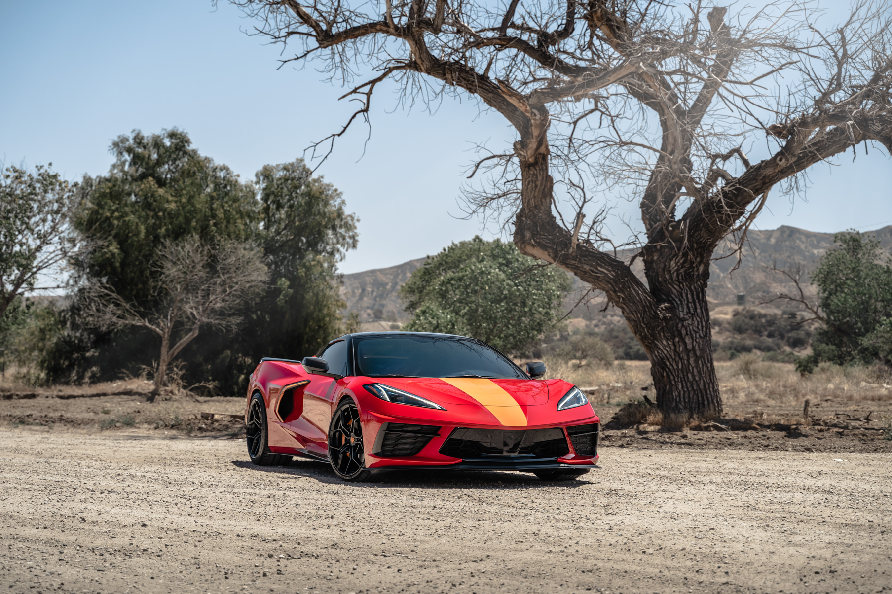 A Red 2021 Chevrolet Corvette C8 on Blaque Diamond BD-F25 Gloss Black Wheels