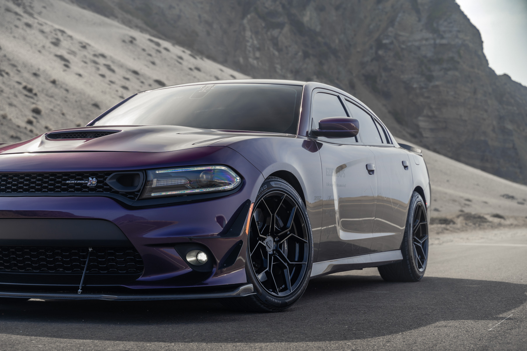 A 2019 Dodge Charger Scat Pack on Blaque Diamond BD-F25 Gloss Black Wheels