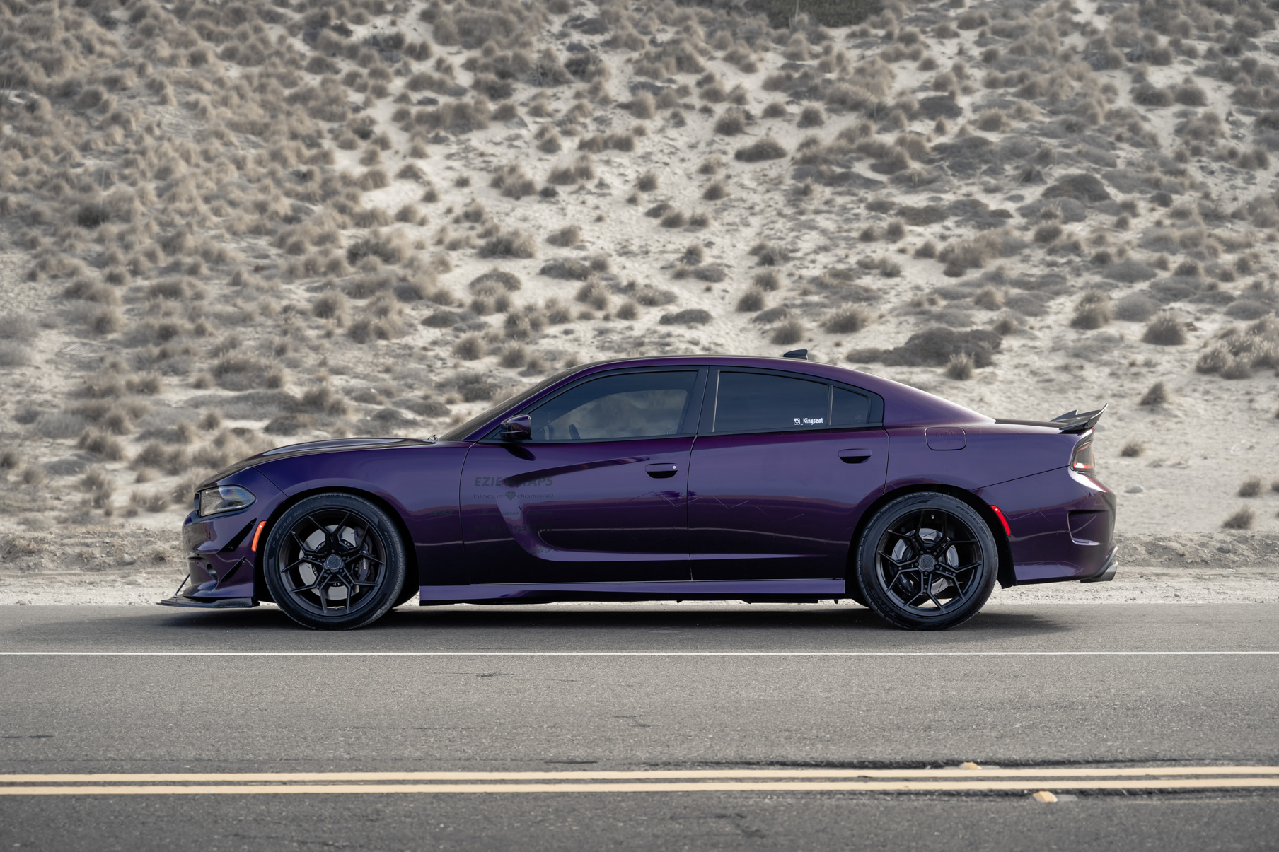A 2019 Dodge Charger Scat Pack on Blaque Diamond BD-F25 Gloss Black Wheels