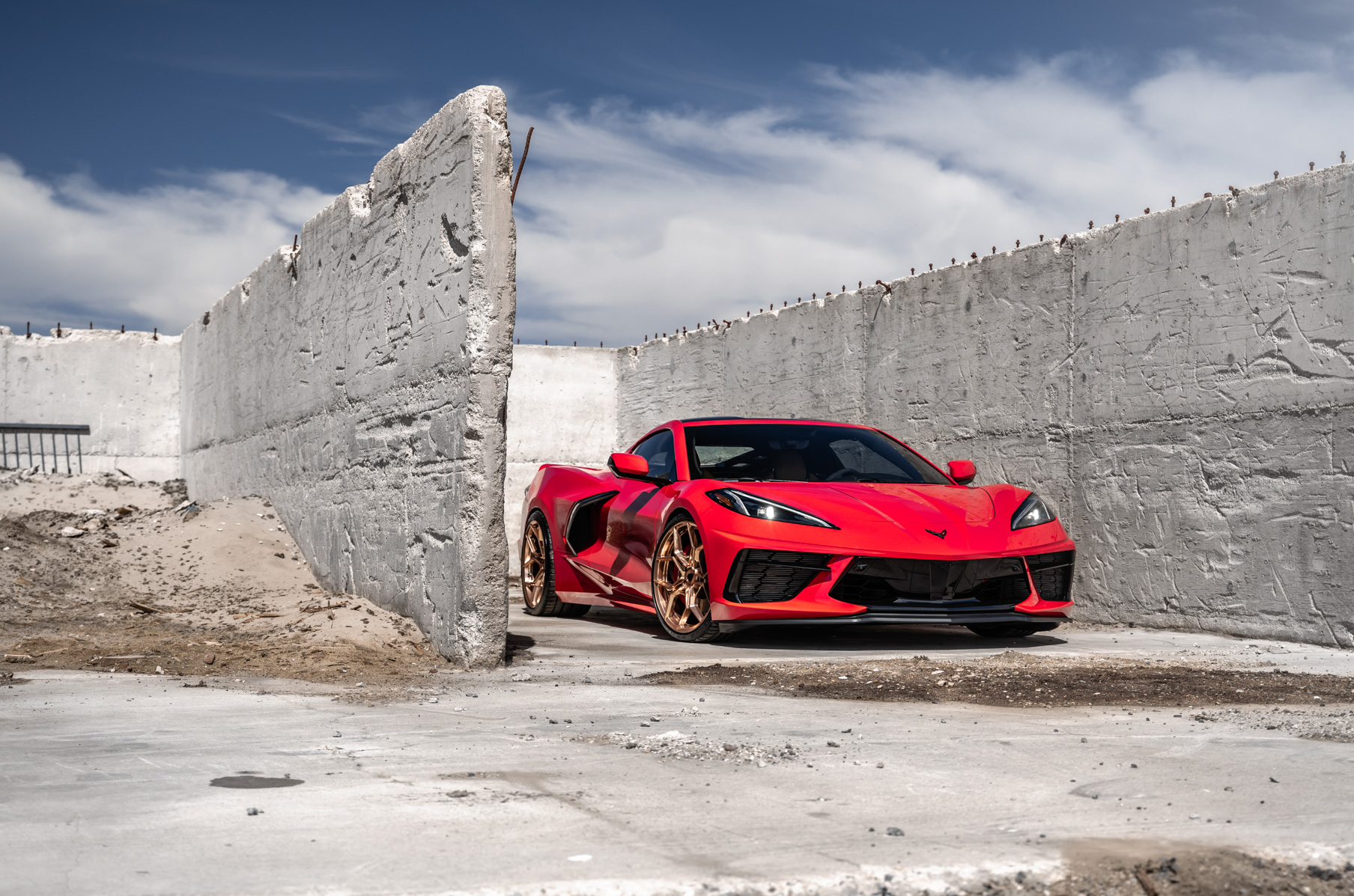 A 2020 Chevrolet Corvette C8 on Blaque Diamond BD-F25 Custom Polished Rose Gold Wheels