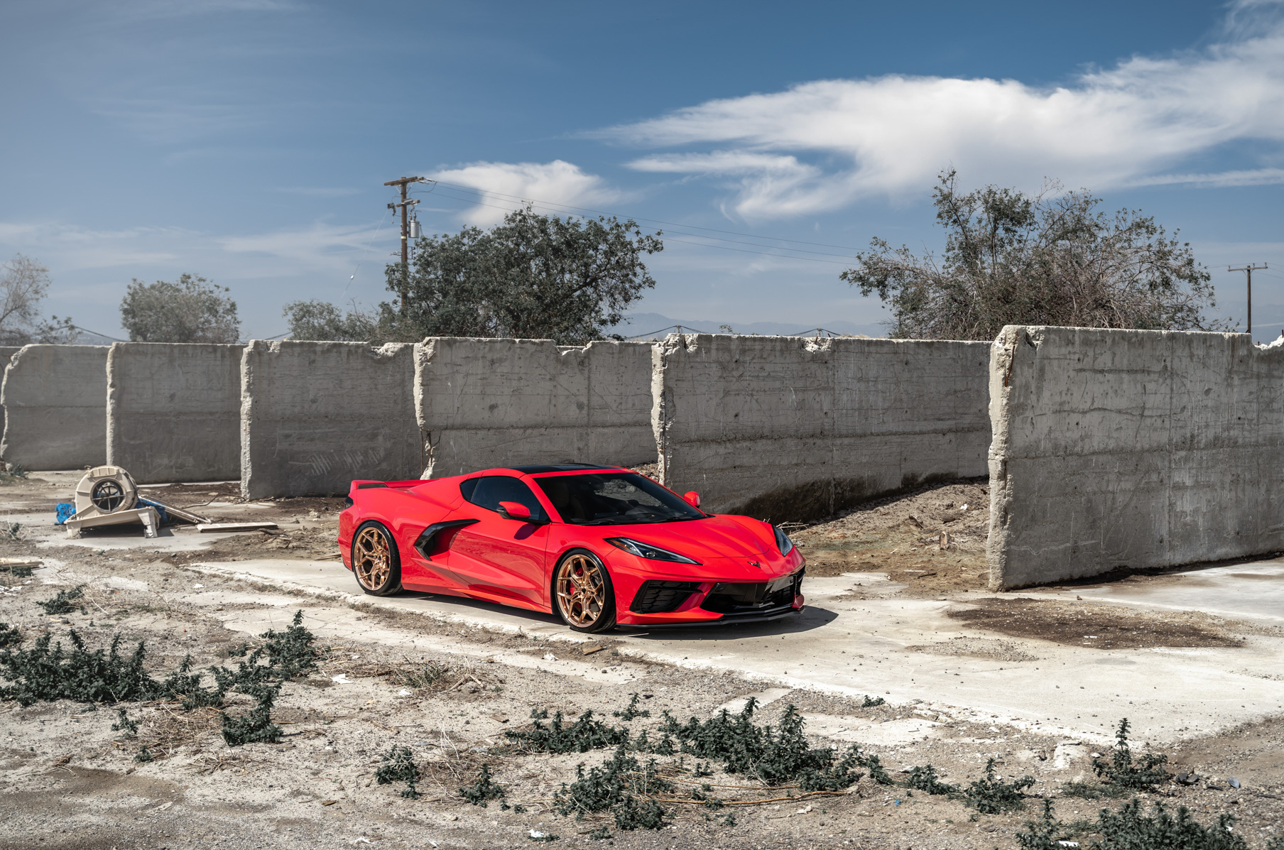 A 2020 Chevrolet Corvette C8 on Blaque Diamond BD-F25 Custom Polished Rose Gold Wheels