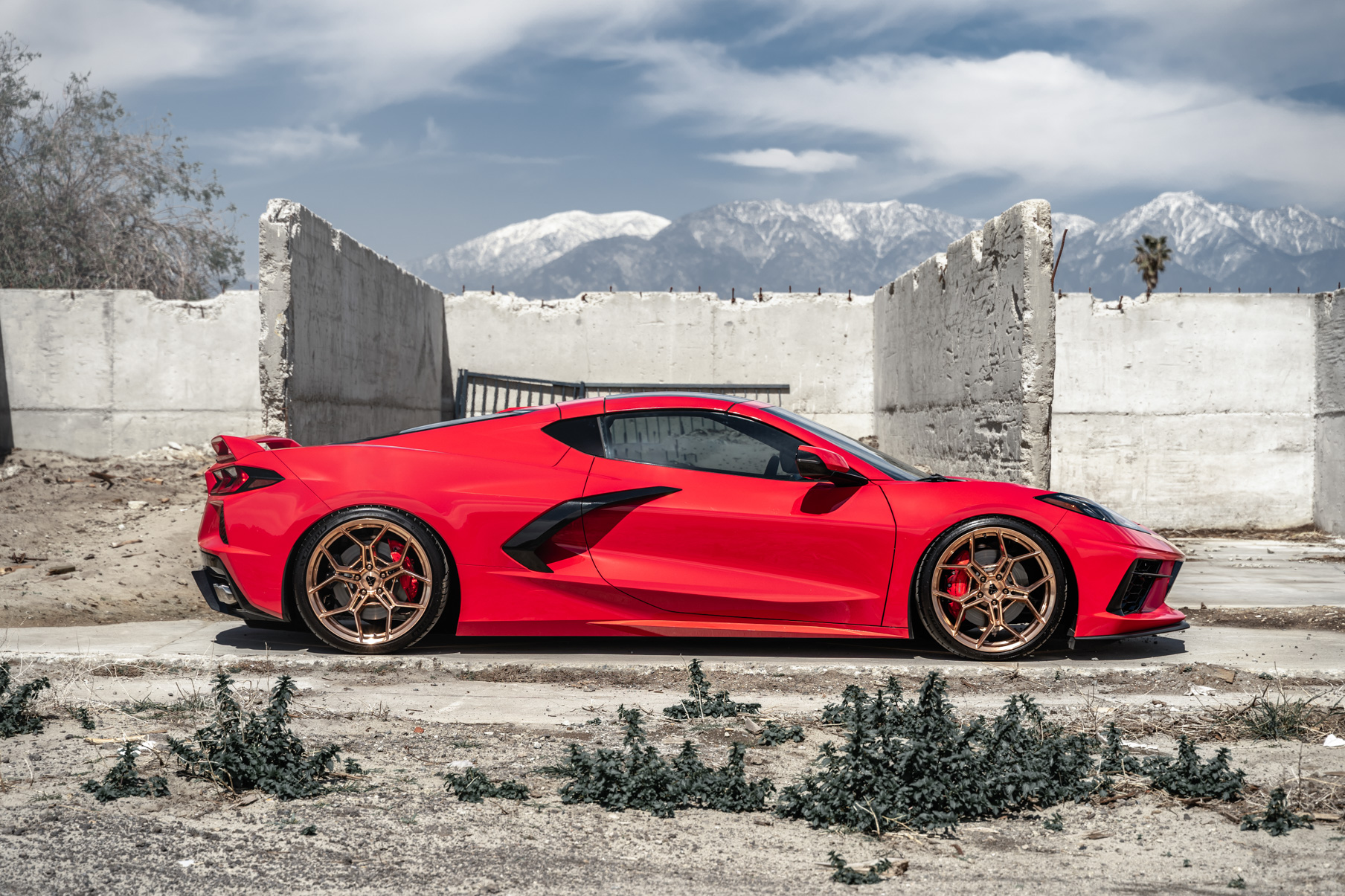 A 2020 Chevrolet Corvette C8 on Blaque Diamond BD-F25 Custom Polished Rose Gold Wheels