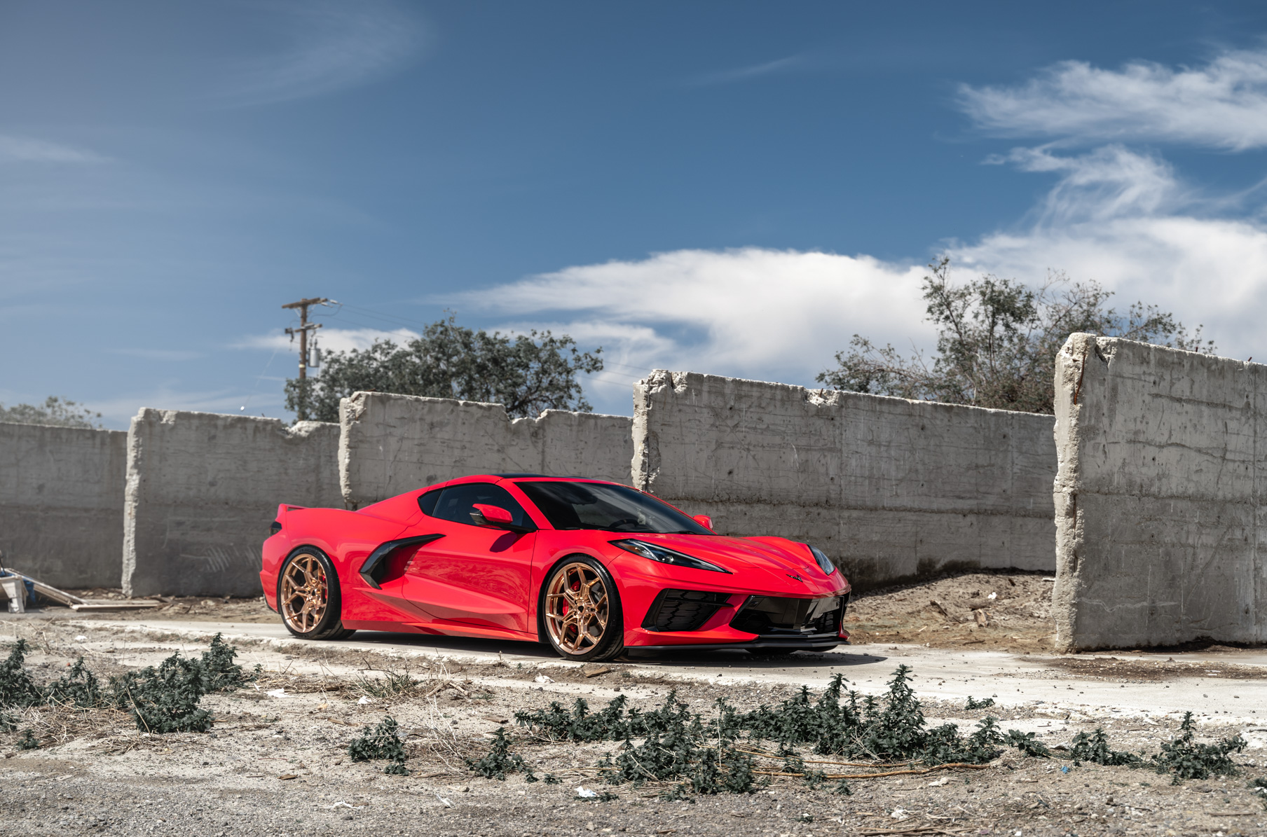 A 2020 Chevrolet Corvette C8 on Blaque Diamond BD-F25 Custom Polished Rose Gold Wheels