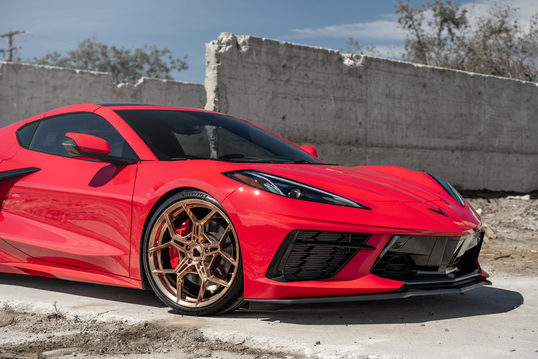 A 2020 Chevrolet Corvette C8 on Blaque Diamond BD-F25 Custom Polished Rose Gold Wheels