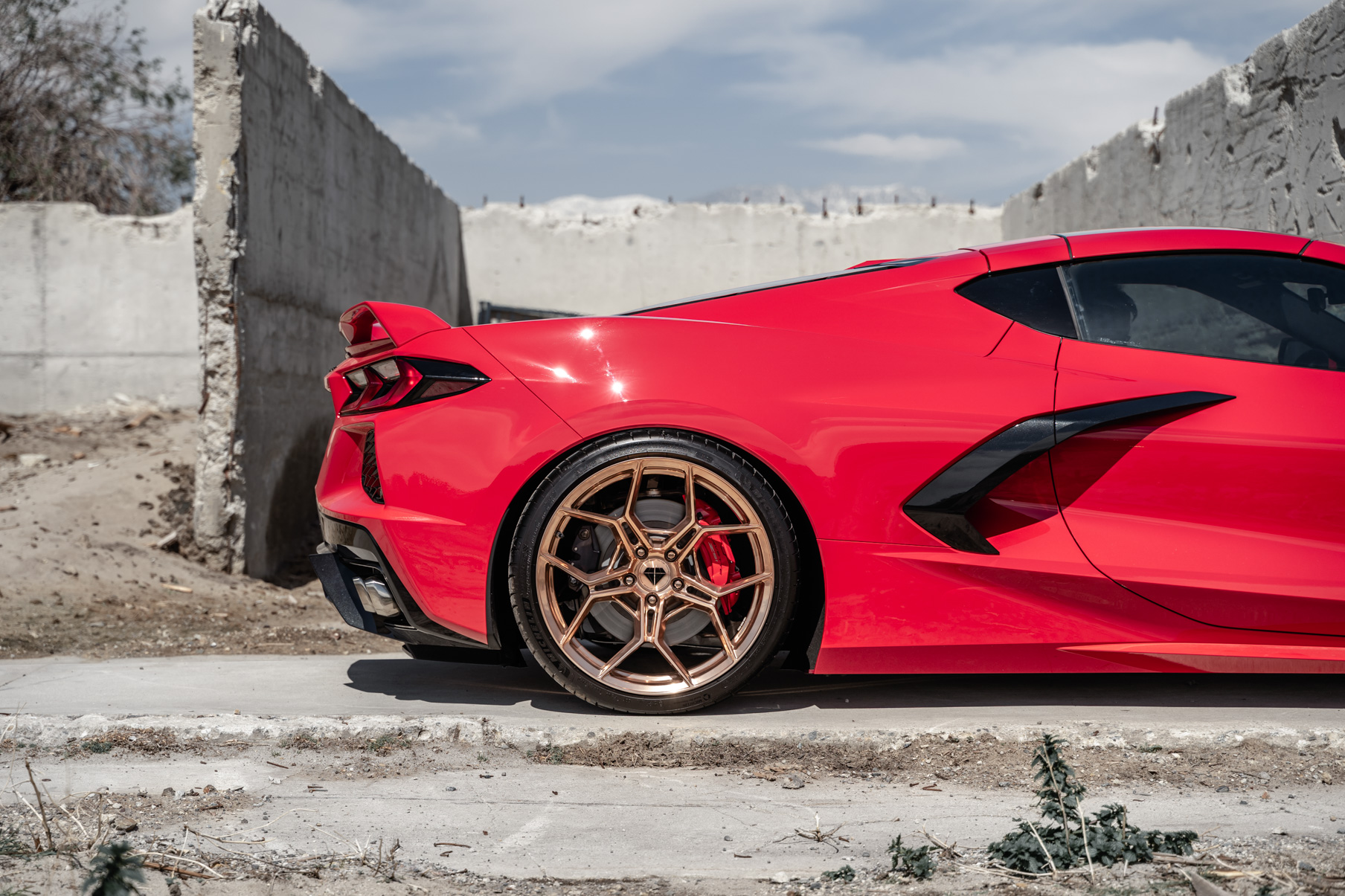 A 2020 Chevrolet Corvette C8 on Blaque Diamond BD-F25 Custom Polished Rose Gold Wheels