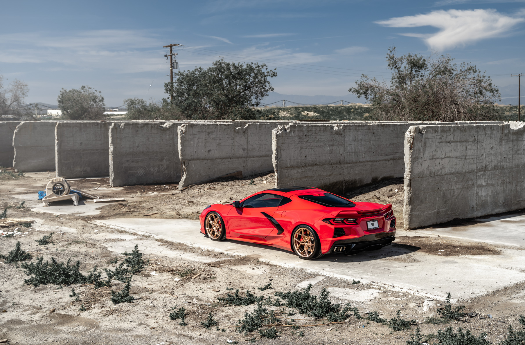 A 2020 Chevrolet Corvette C8 on Blaque Diamond BD-F25 Custom Polished Rose Gold Wheels