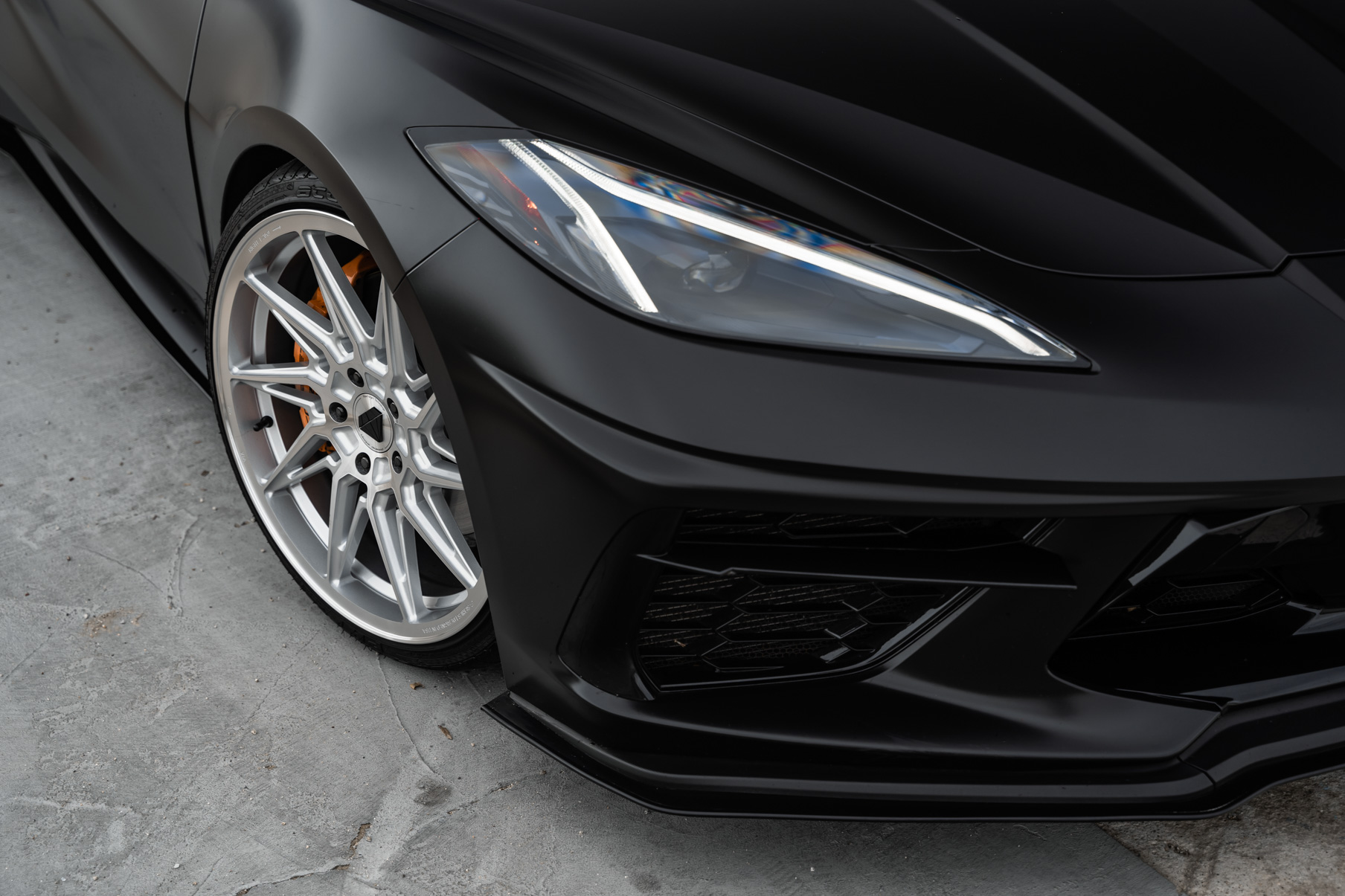 A 2021 Chevrolet Corvette C8 on Blaque Diamond BD-F20 Brushed Silver Wheels