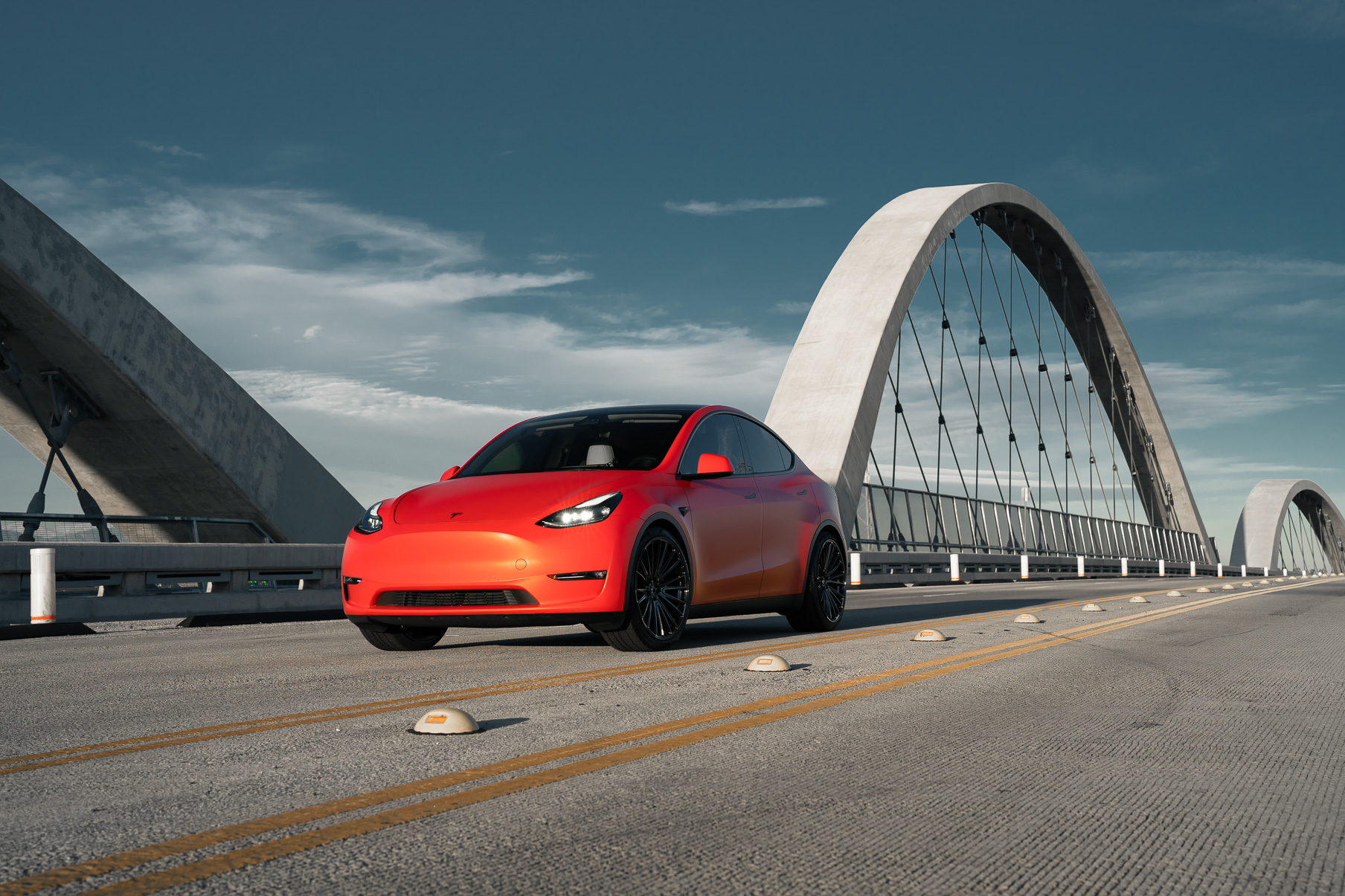 A Matte Red 2022 Tesla Model Y on Blaque Diamond BD-715 Gloss Black Wheels